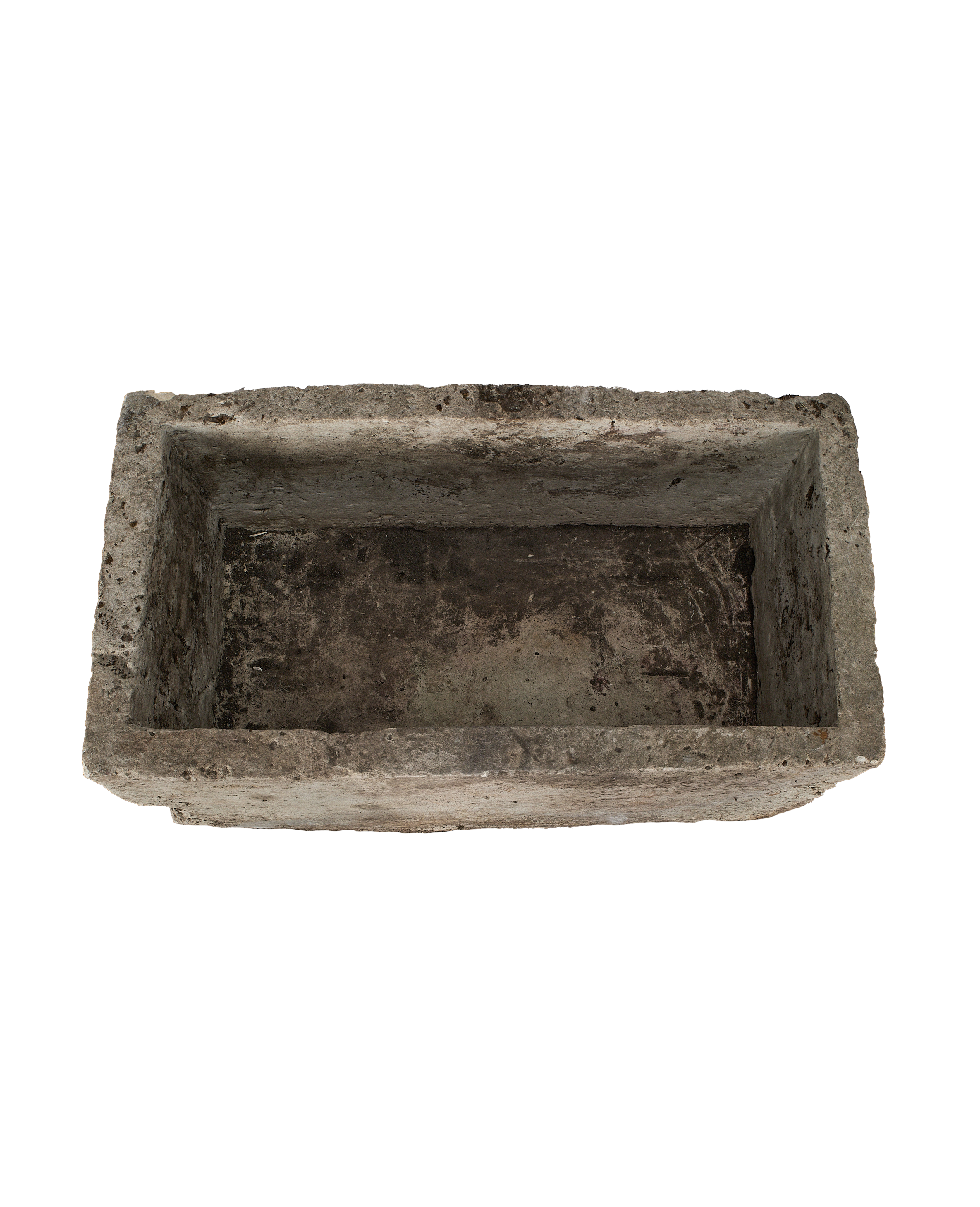 Vintage Indonesian limestone trough, top view showing weathered, rough textured interior.