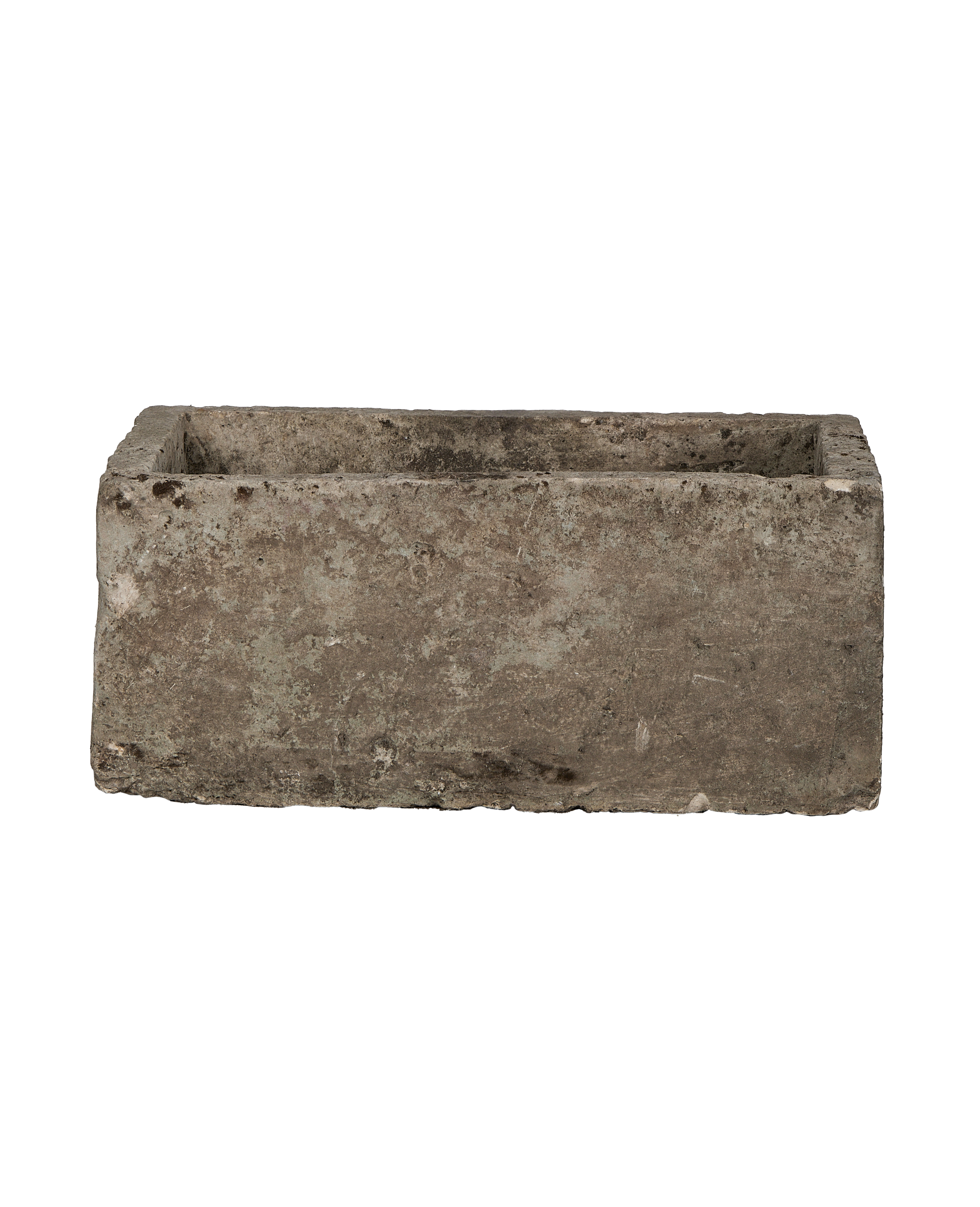 Vintage rectangular limestone trough, showing rough textured exterior and earthy tones.