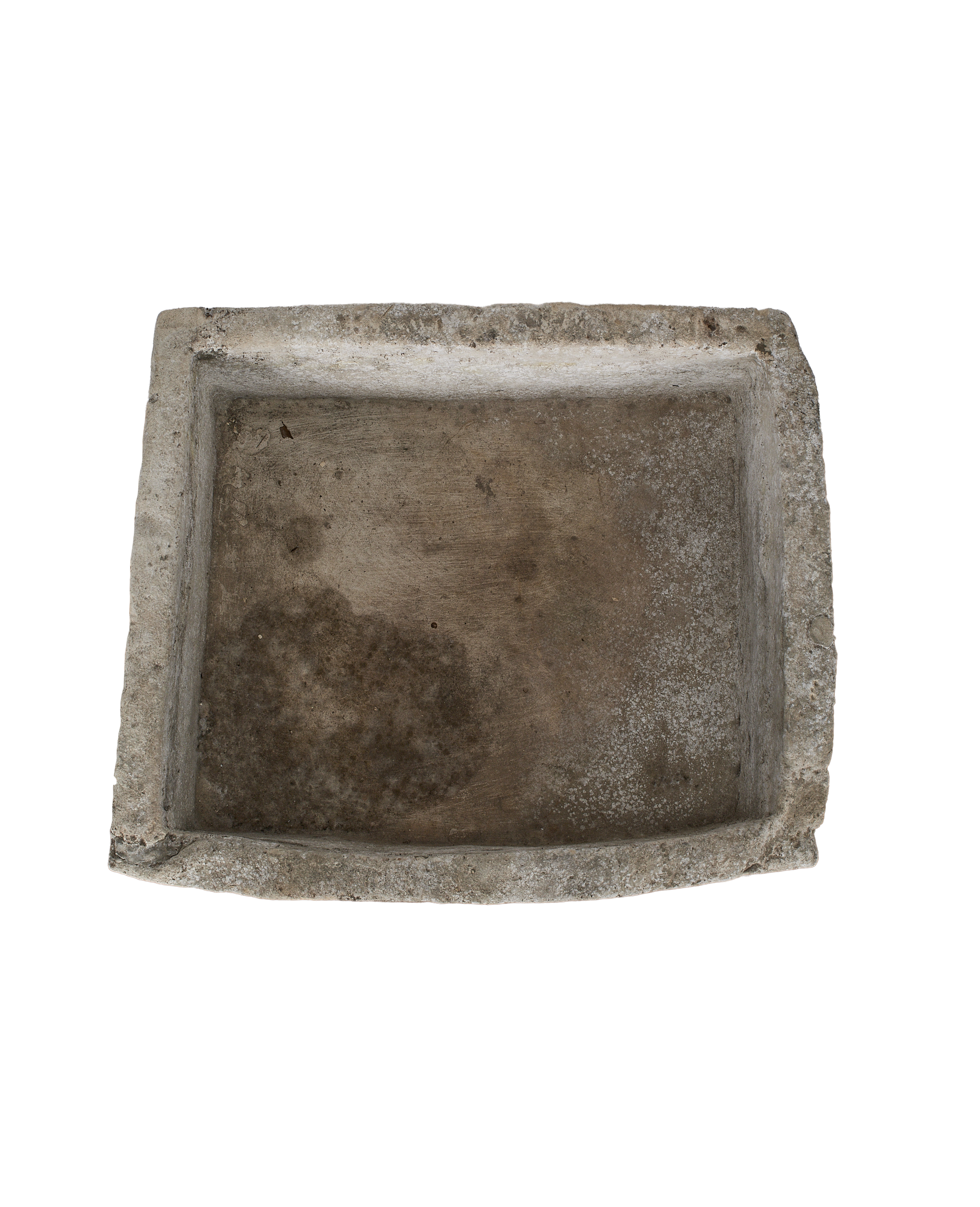 Vintage Indonesian limestone rectangle trough, top-down view showing interior erosion and unique rounded side.