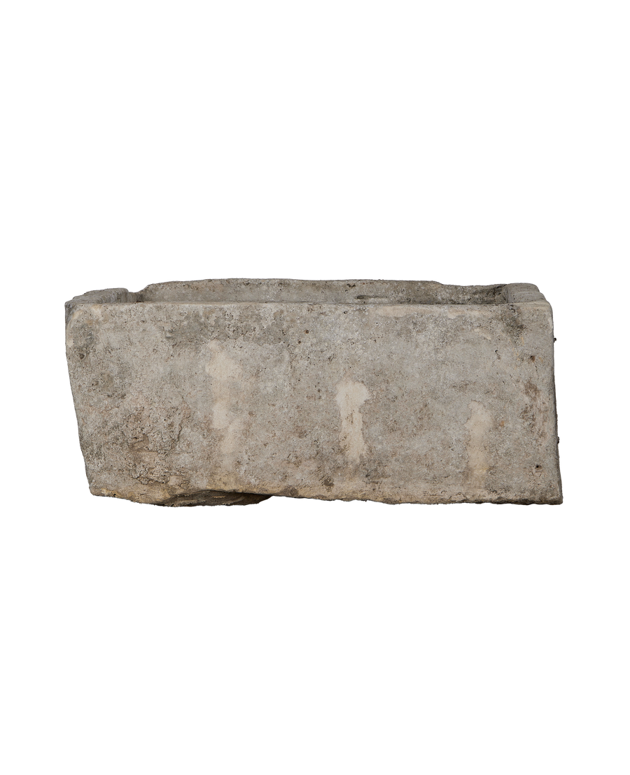 Vintage rectangular limestone trough, rustic Indonesian planter with aged texture, detailed side view.