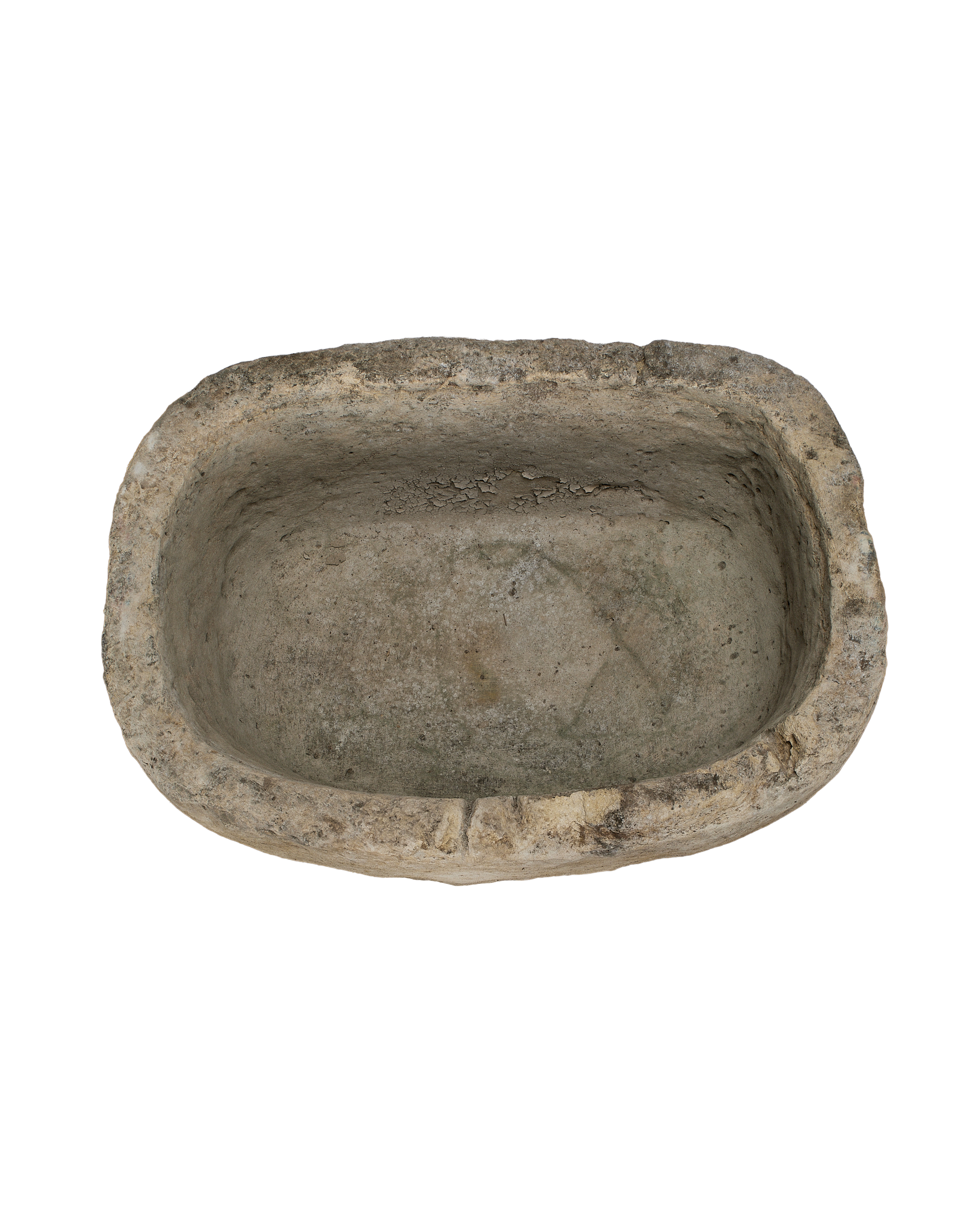 Oblong vintage Indonesian limestone trough, top-down view showing interior texture and condition.