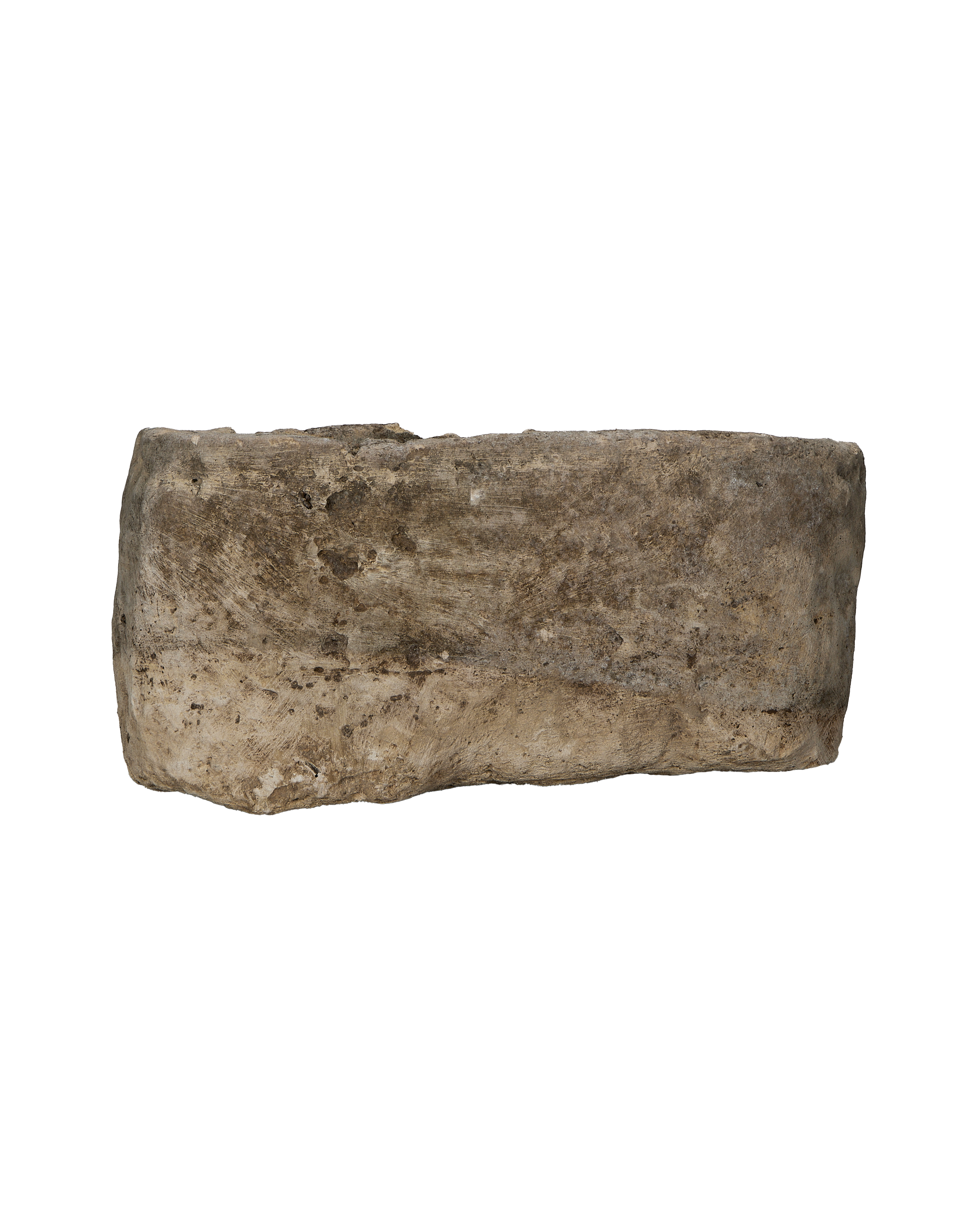 Vintage Indonesian oblong limestone trough viewed from the side, showcasing its weathered, rugged texture.