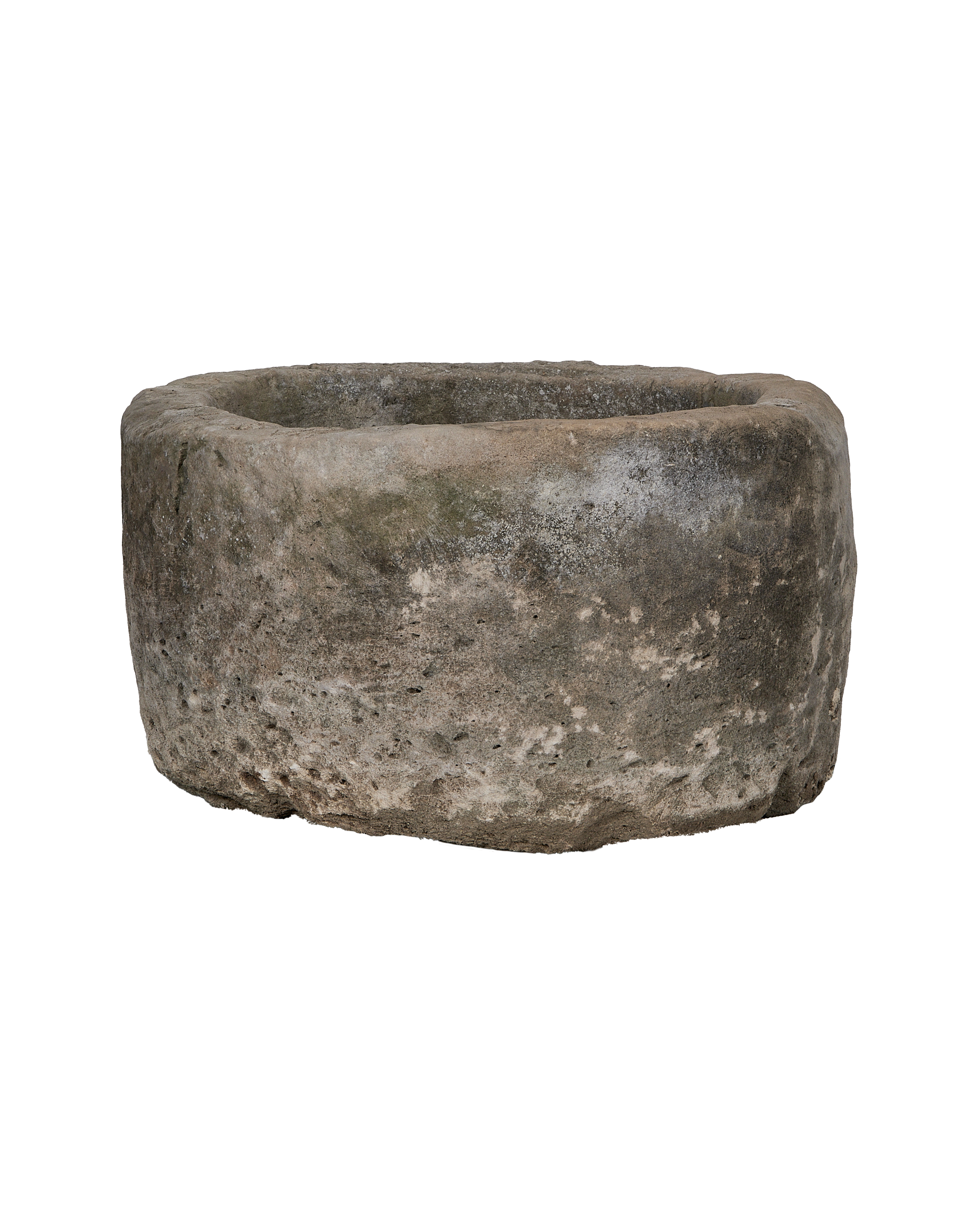 Vintage round Indonesian limestone trough, detailed side view showing rough texture and natural patina.