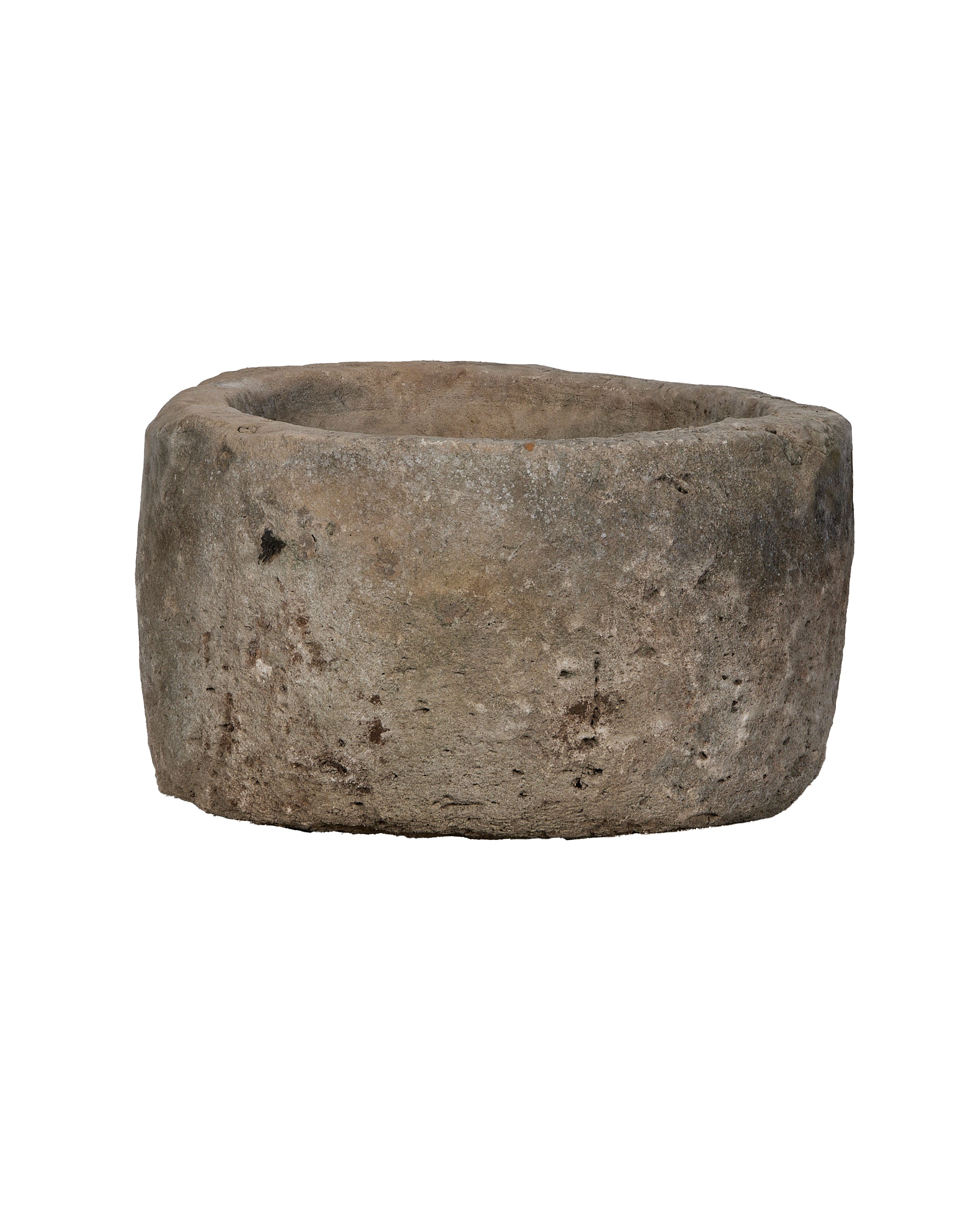 Vintage Indonesian round limestone trough, showing weathered texture and natural imperfections.