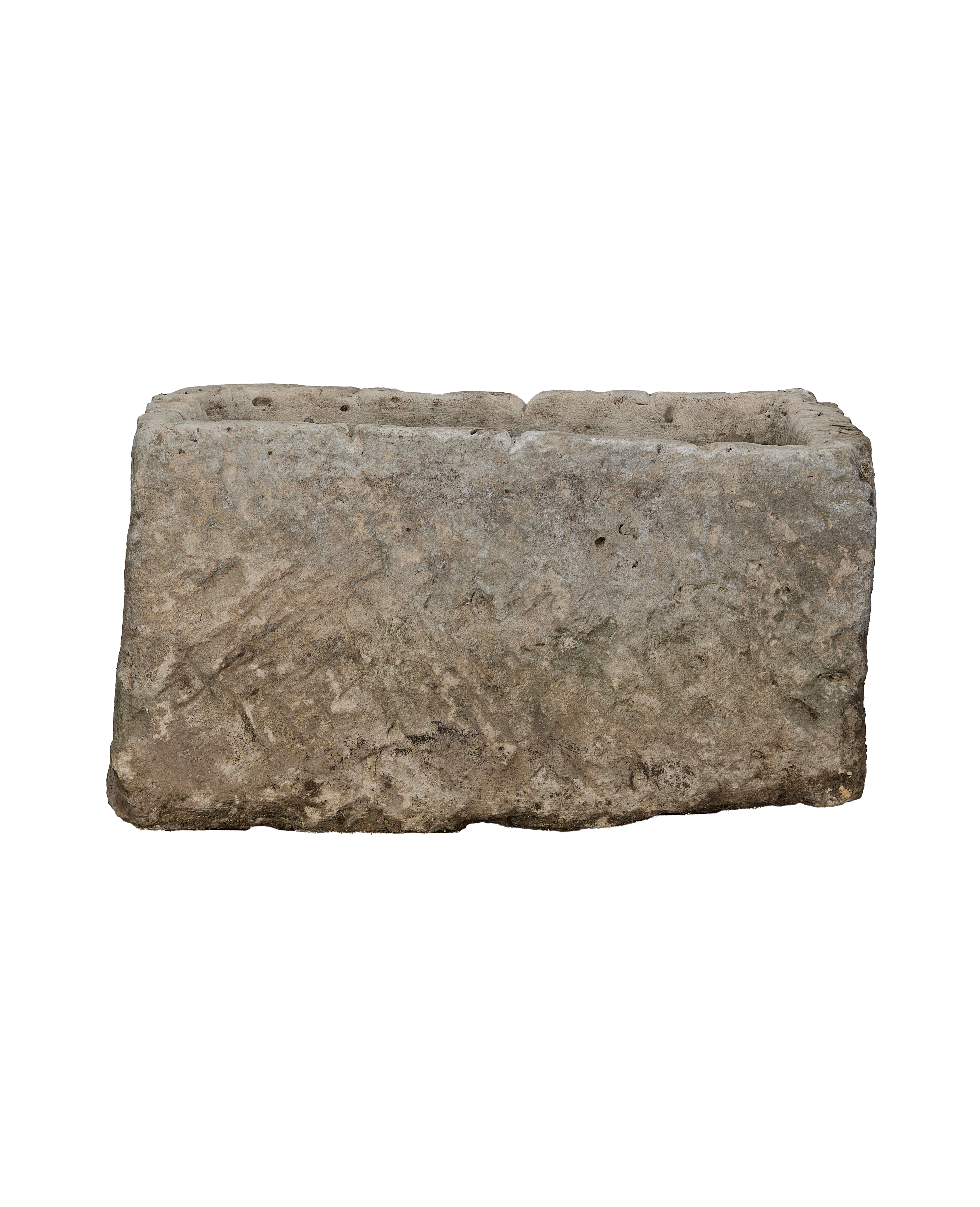 Vintage rectangular limestone trough from Indonesia with rugged, weathered surface and subtle moss remnants.