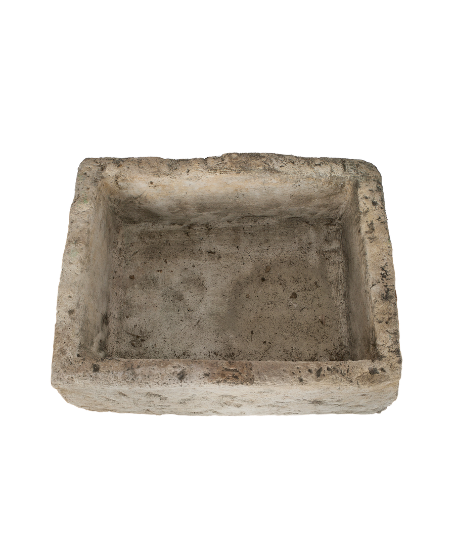Vintage Indonesian limestone trough (OAK), rectangular, showing the inner basin with a weathered, textured surface.