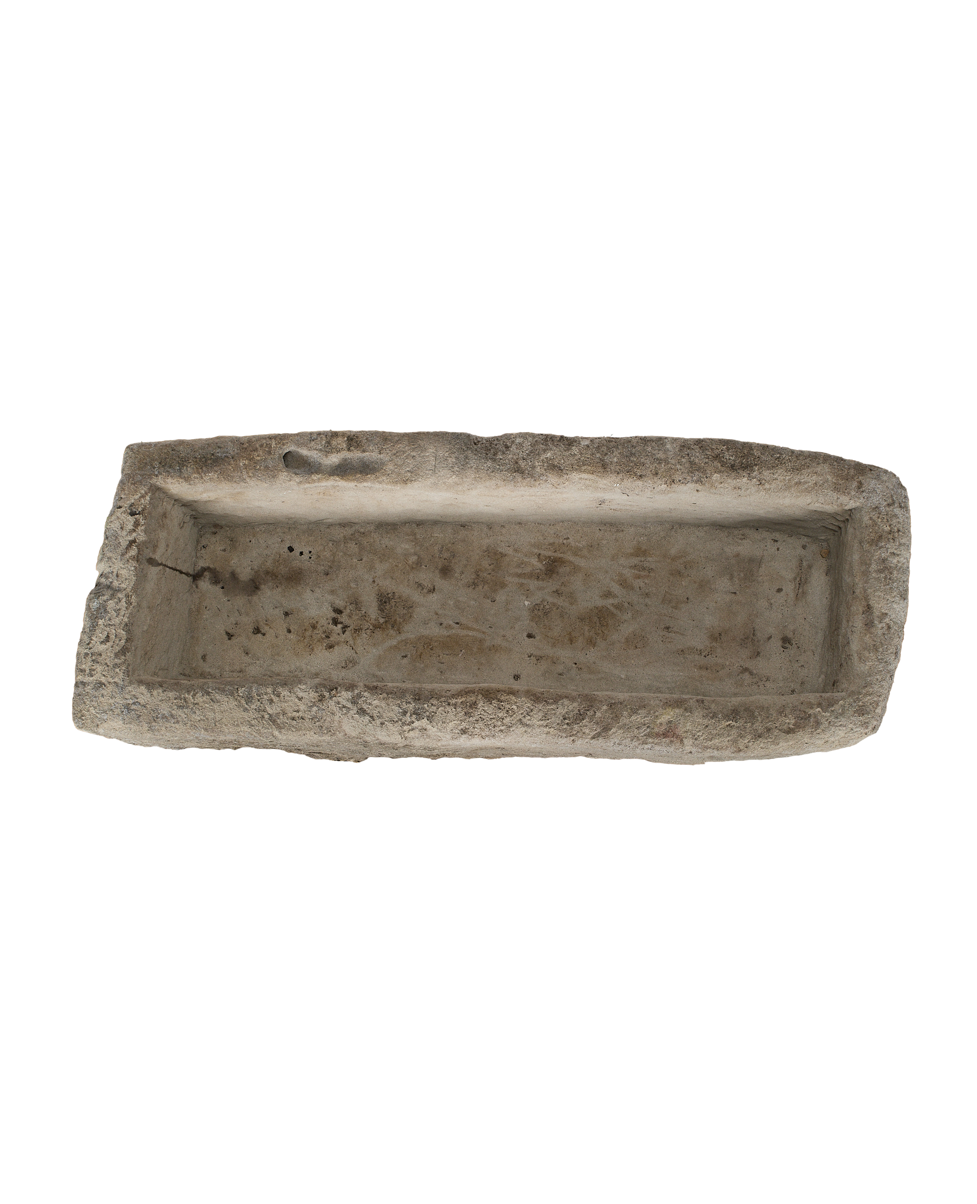 Vintage Indonesian limestone trough (OAK), overhead view showing rectangular interior and weathered texture.