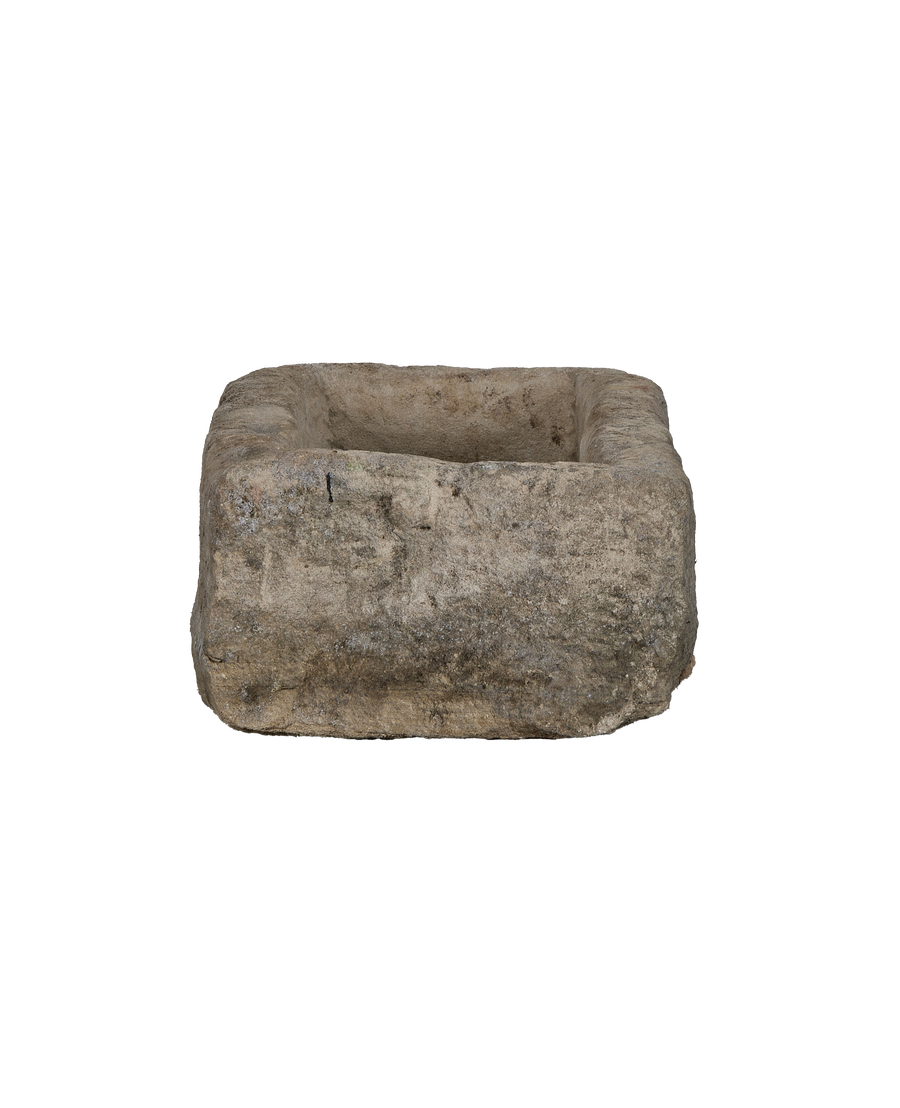 Vintage Indonesian rectangular limestone trough, front view showing weathered texture and interior depth.