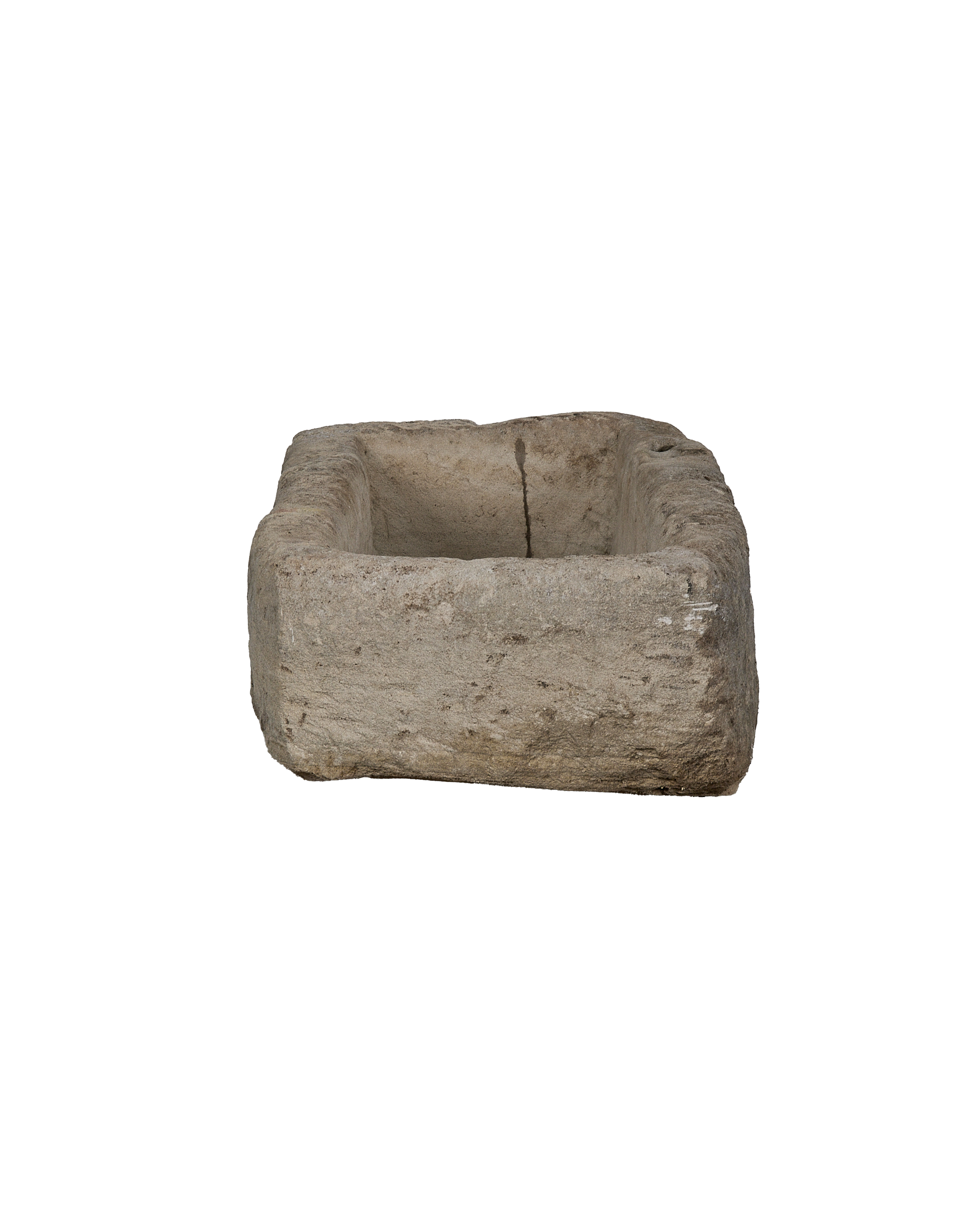Vintage Indonesian limestone trough viewed from above, showcasing rustic texture and aged condition.
