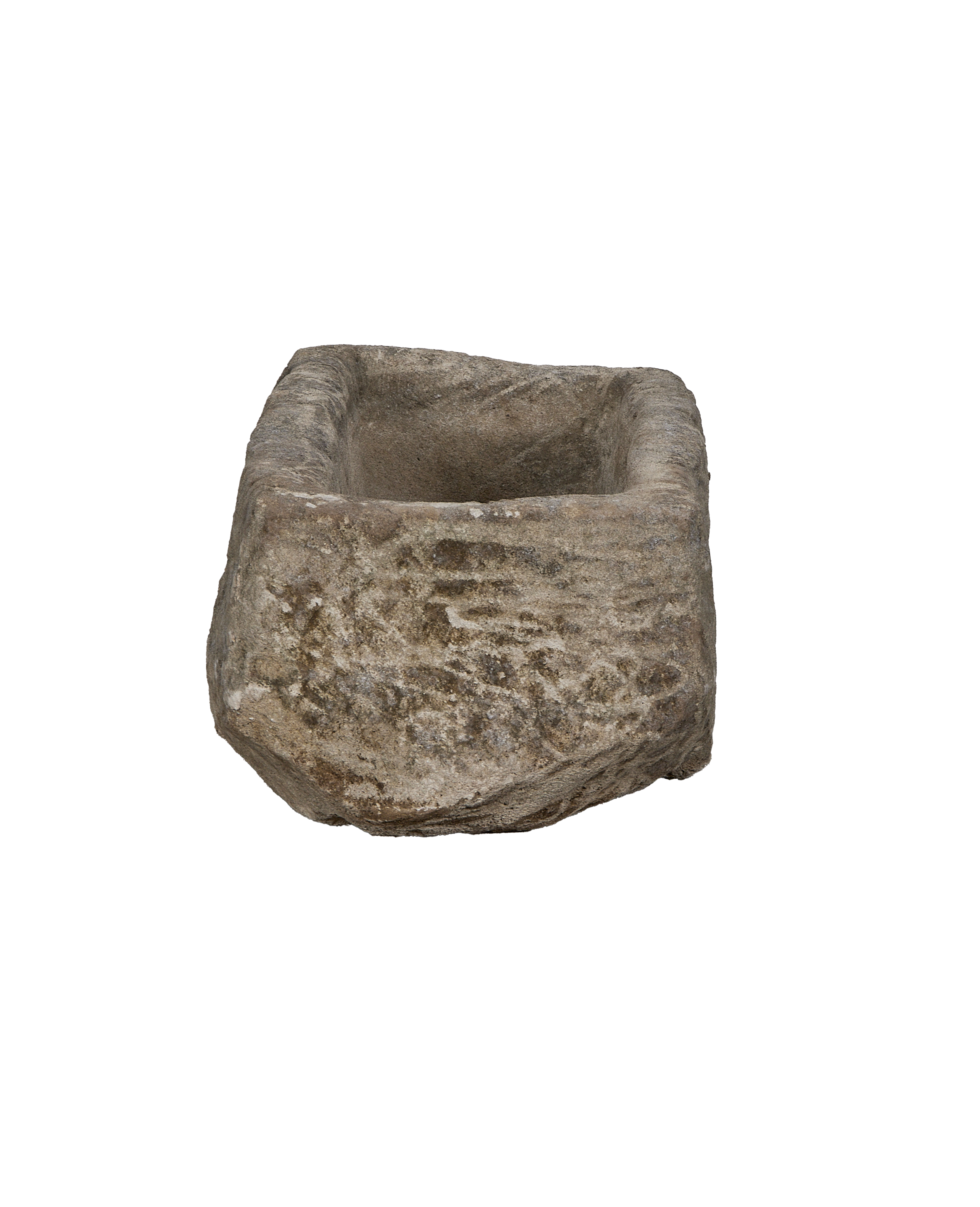 Vintage rectangular limestone trough, showing the rough, weathered texture and eroded surface details.