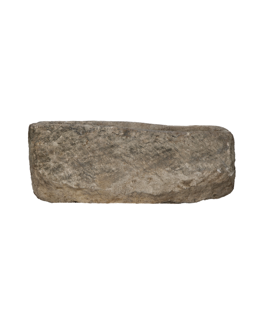 Vintage rectangular limestone trough, showing a full side and rim detail.