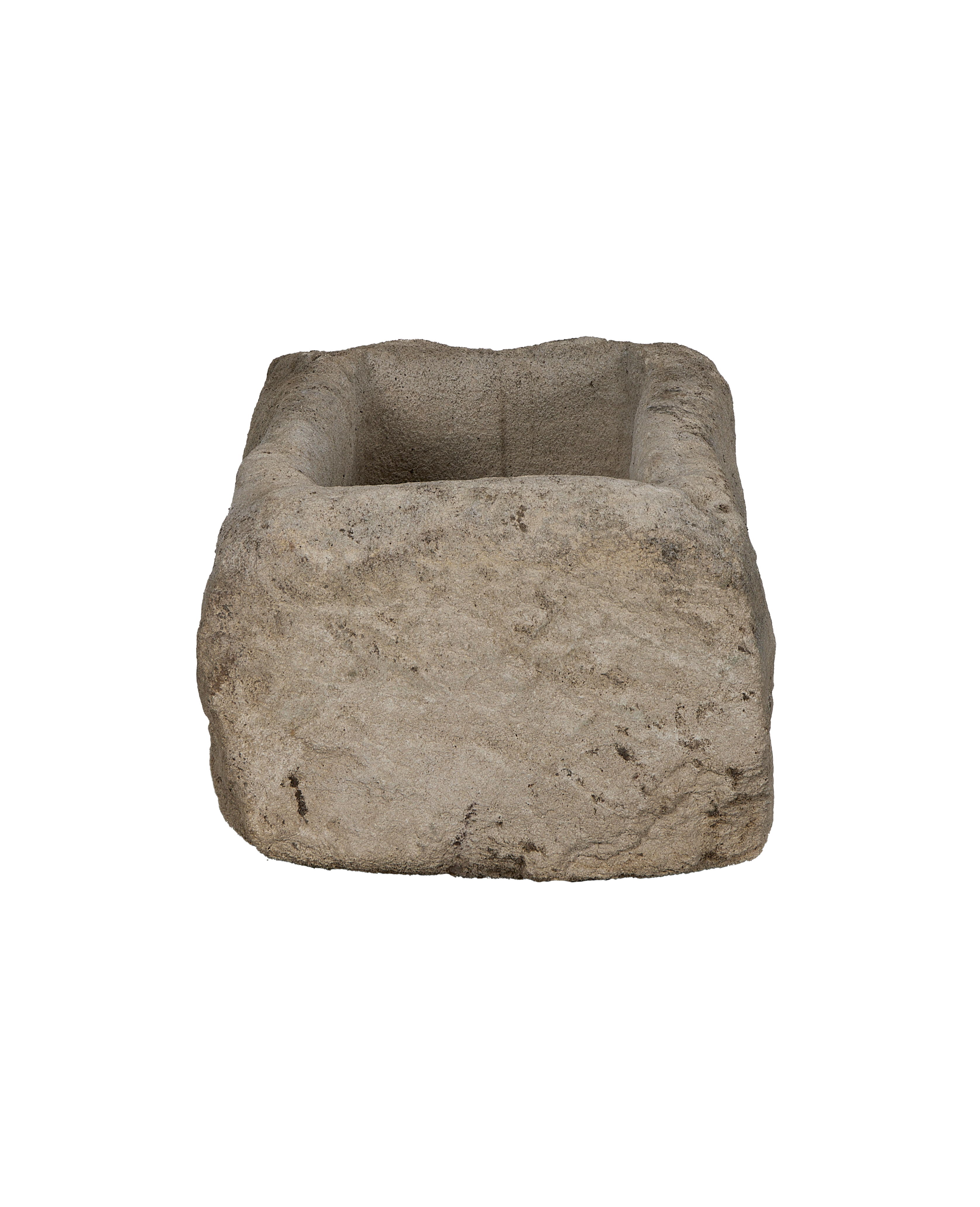 Vintage rectangular limestone trough, showing the rough textured exterior and carved interior.