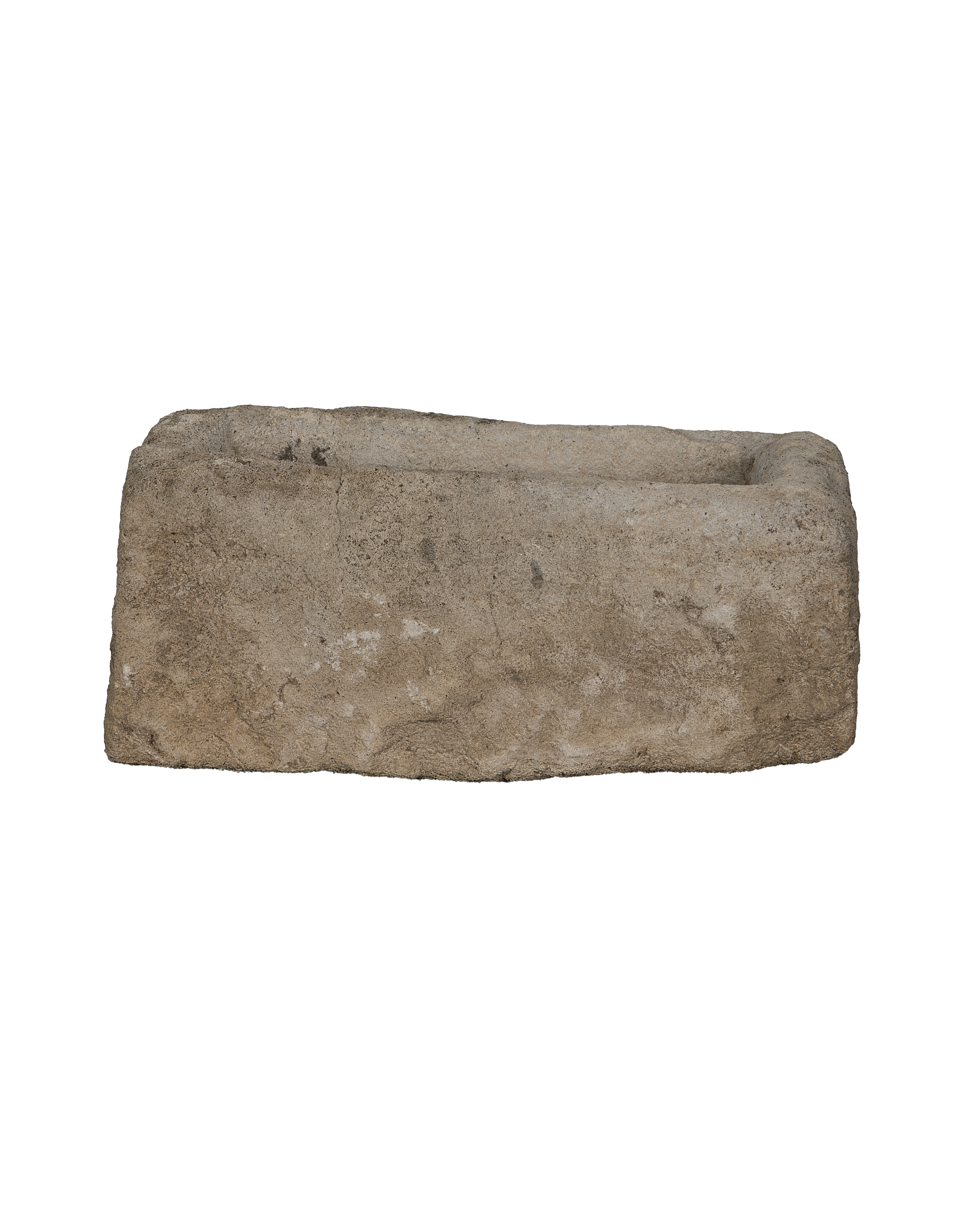 Vintage Indonesian rectangular limestone trough, side profile showcasing rough texture.
