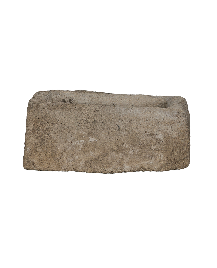 Vintage Indonesian rectangular limestone trough, side profile showcasing rough texture.