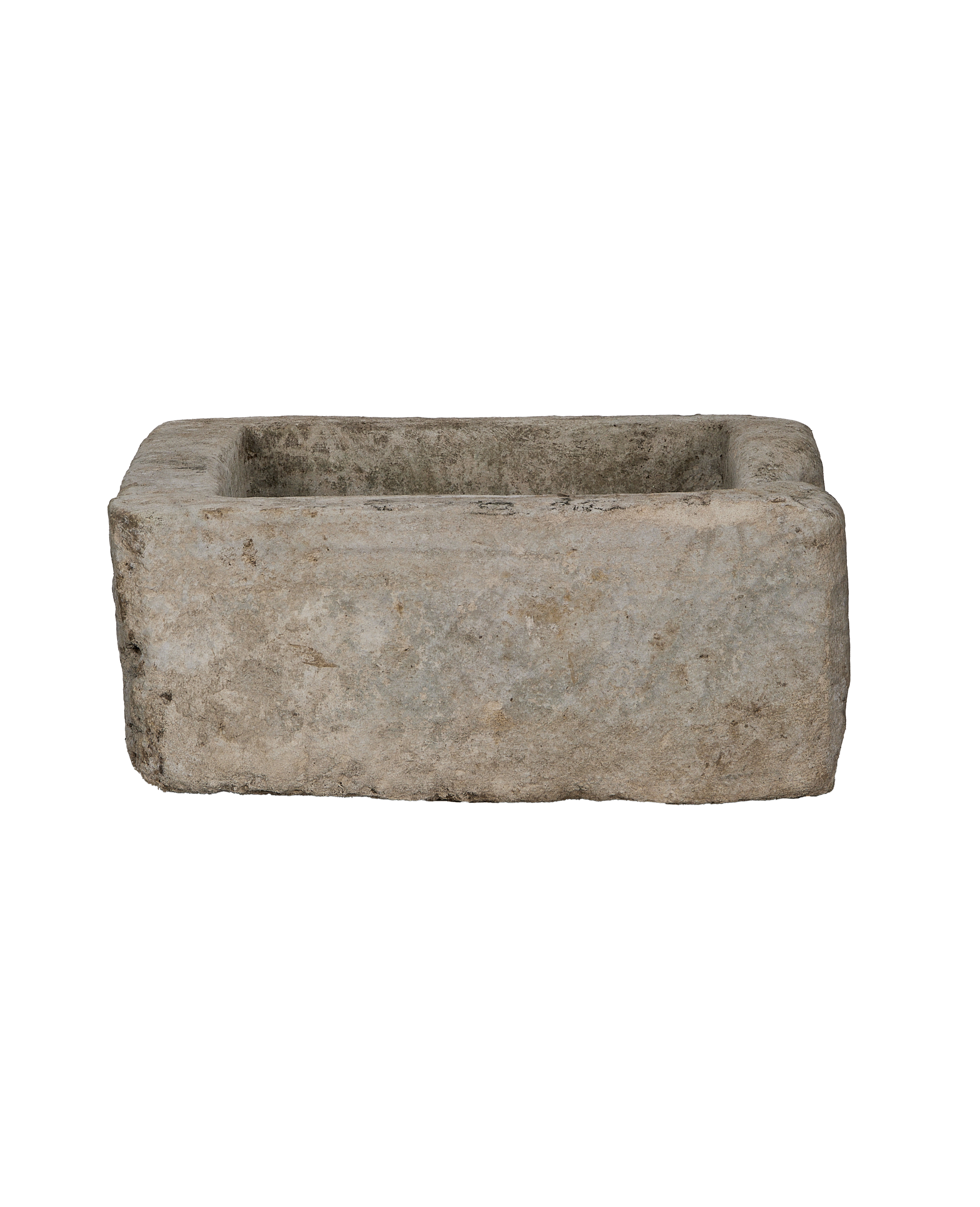 Vintage Indonesian limestone trough (Oak), rectangular, showing the rough, weathered exterior texture.