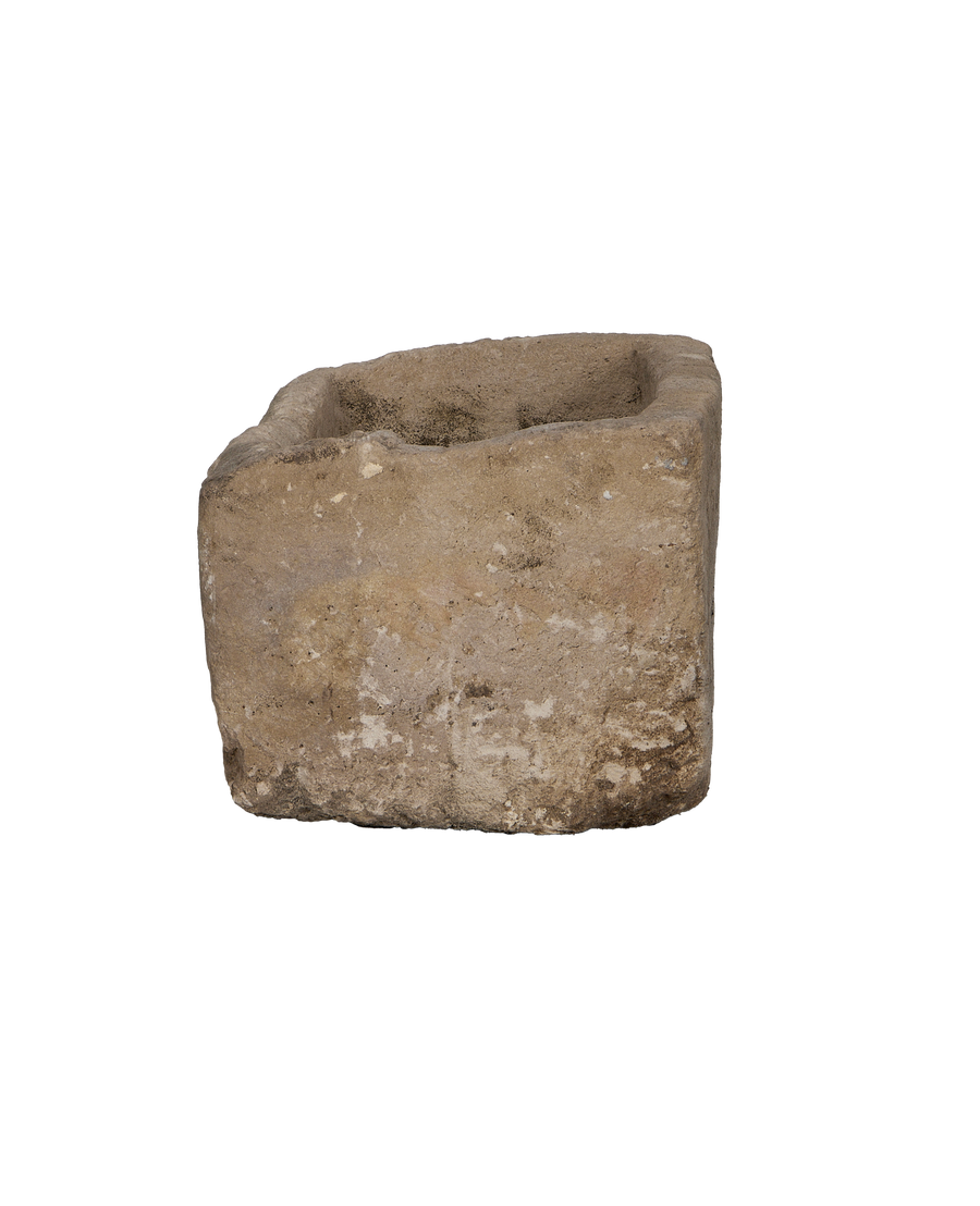 Vintage Indonesian limestone rectangle planter trough, weathered natural stone texture.