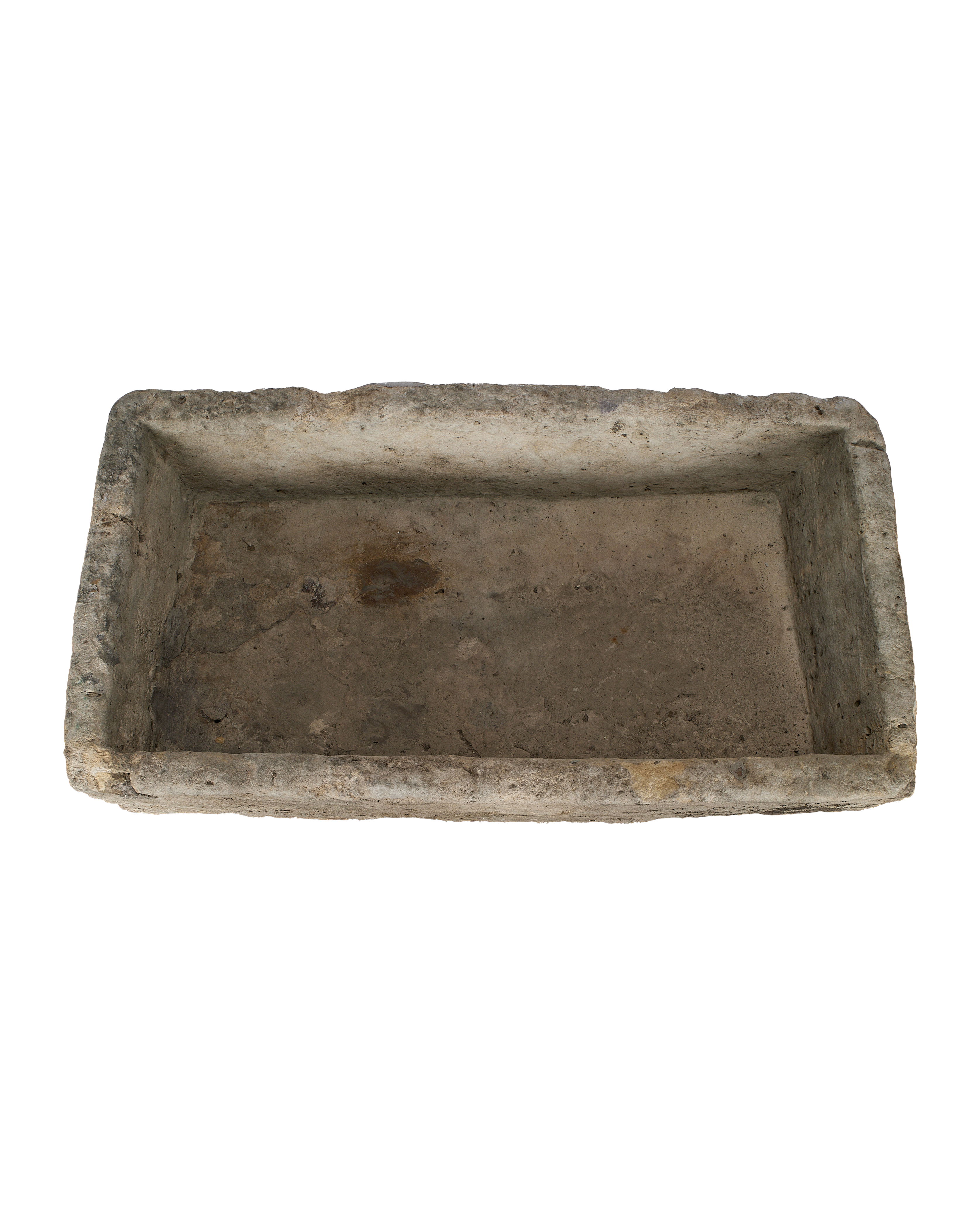 Vintage Indonesian limestone trough, top view of rectangular opening with weathered texture.