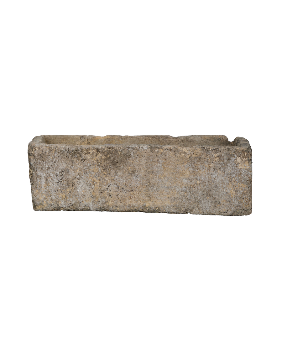 Vintage rectangular limestone trough, showing its weathered, natural grey and tan textured surface.