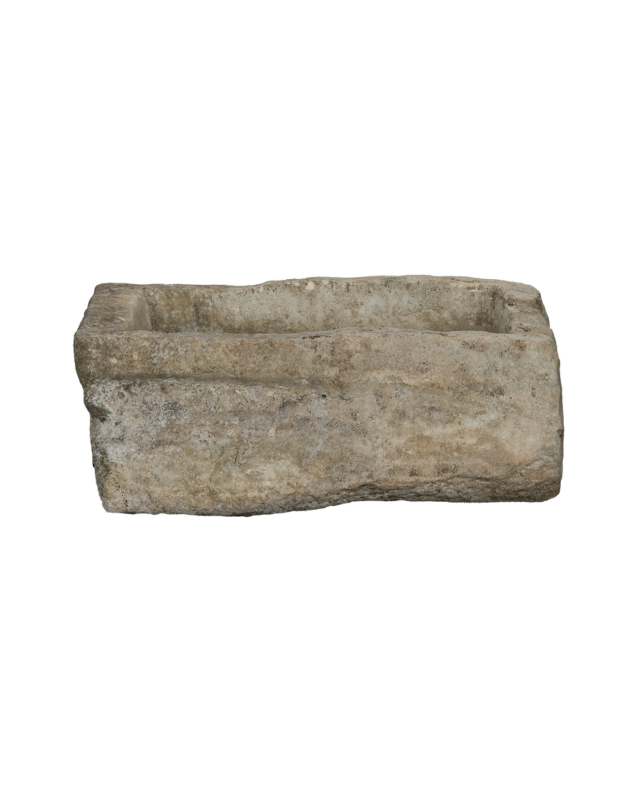 Vintage Indonesian limestone trough, rectangular, showcasing its weathered, rugged texture and natural imperfections.