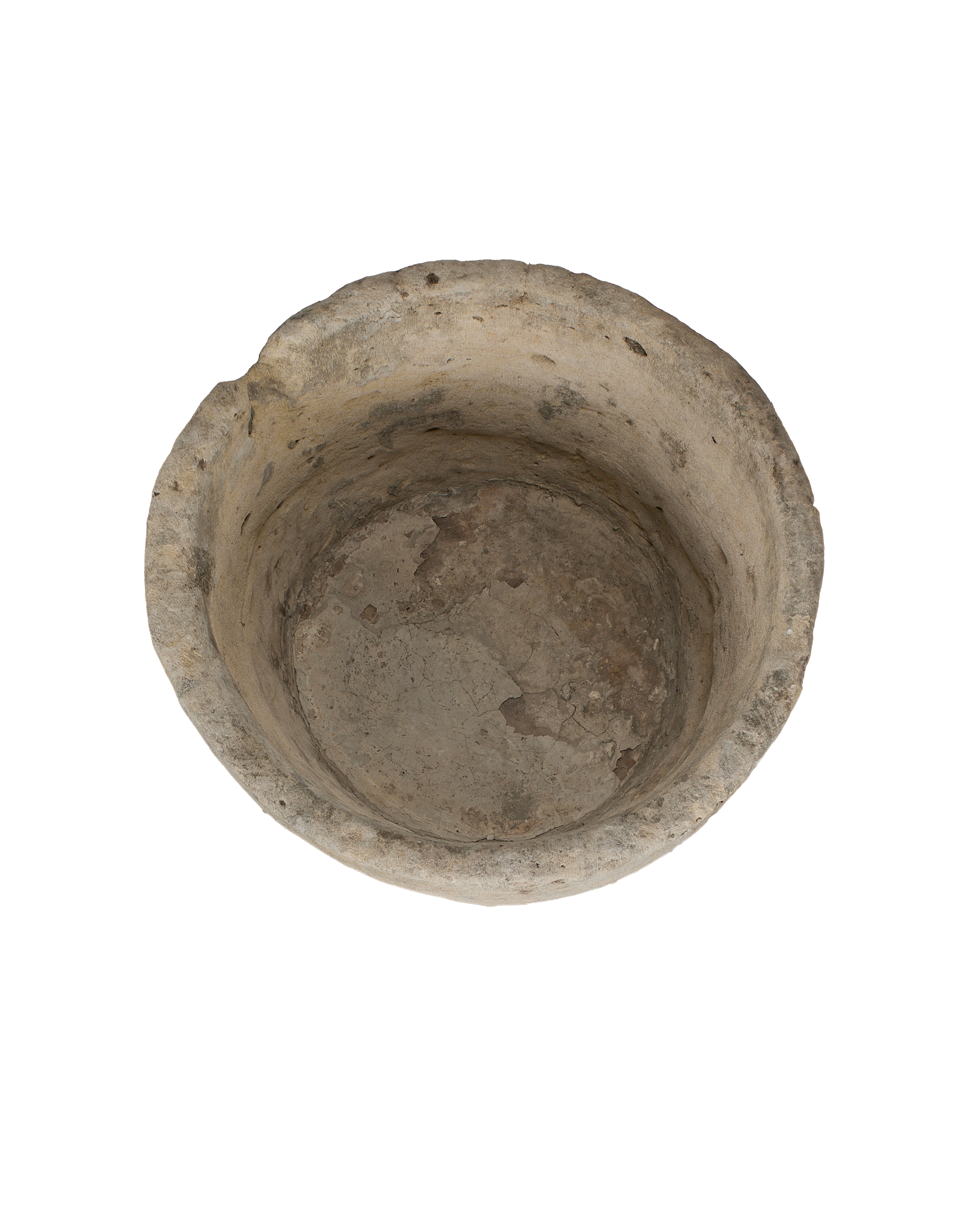 Vintage round Indonesian limestone trough, top view reveals aged interior and worn texture.