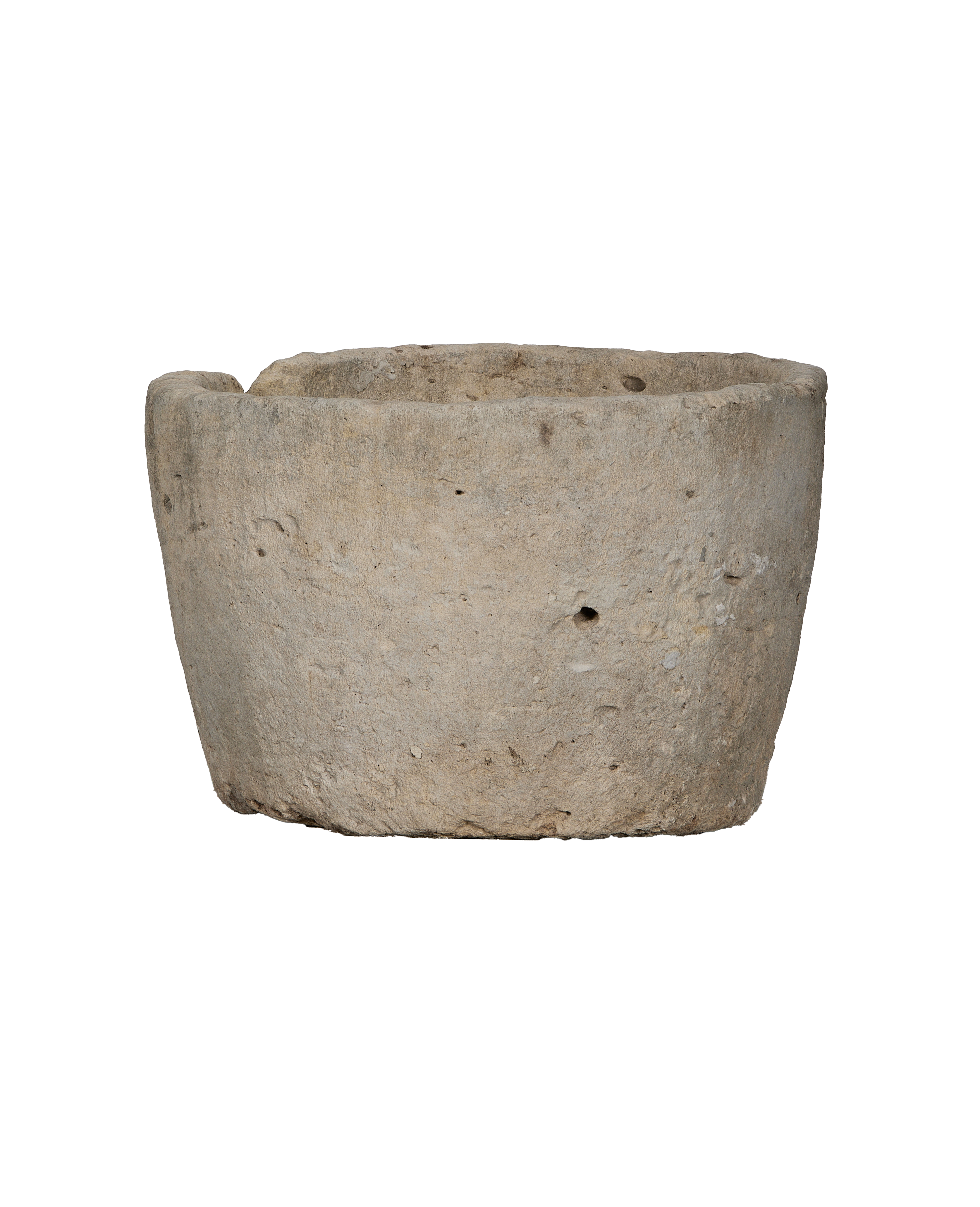 Vintage Indonesian round limestone trough, light gray, with natural pitting and rough texture.