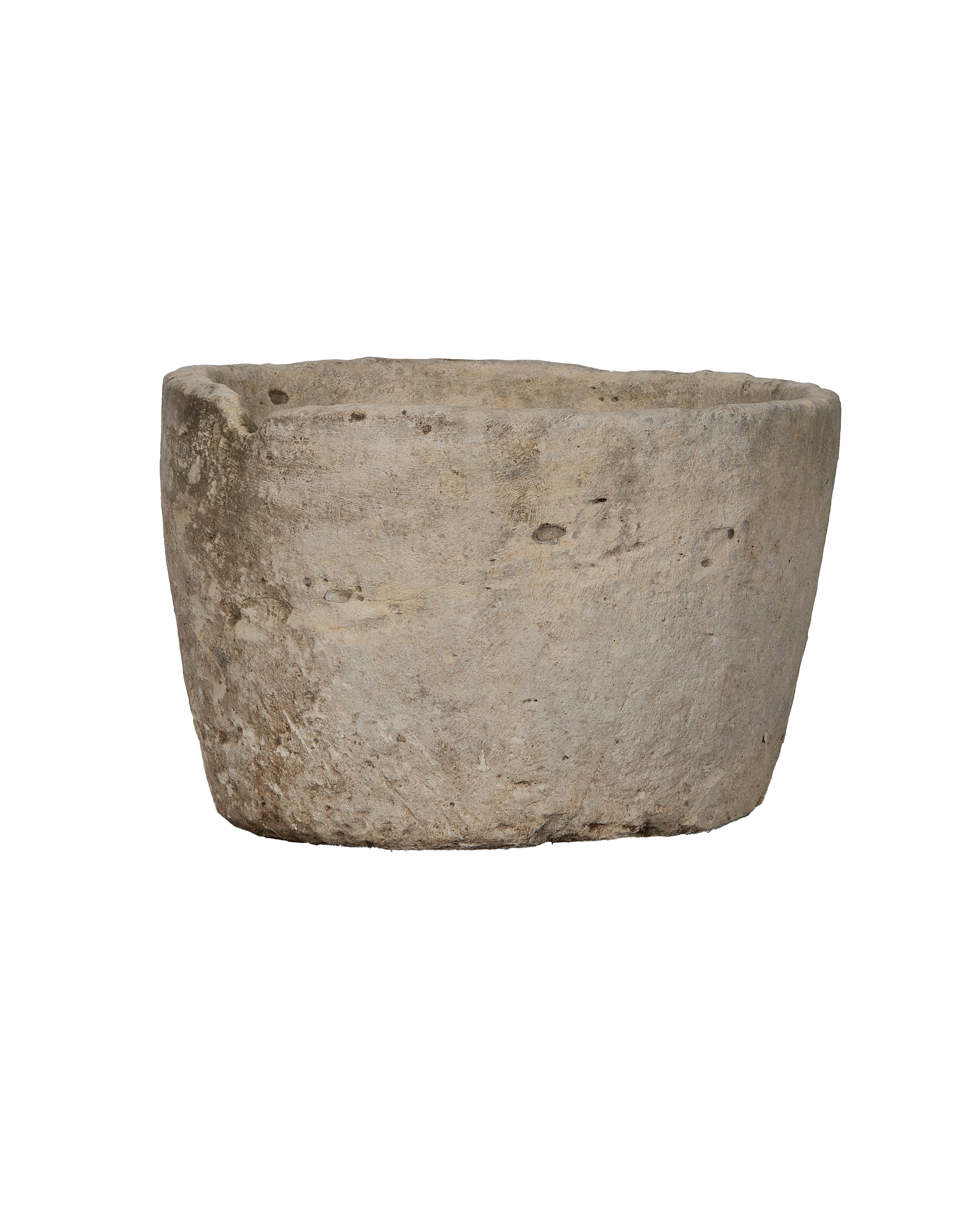 Vintage round limestone trough, Indonesia origin, showing textured exterior and weathered edge.