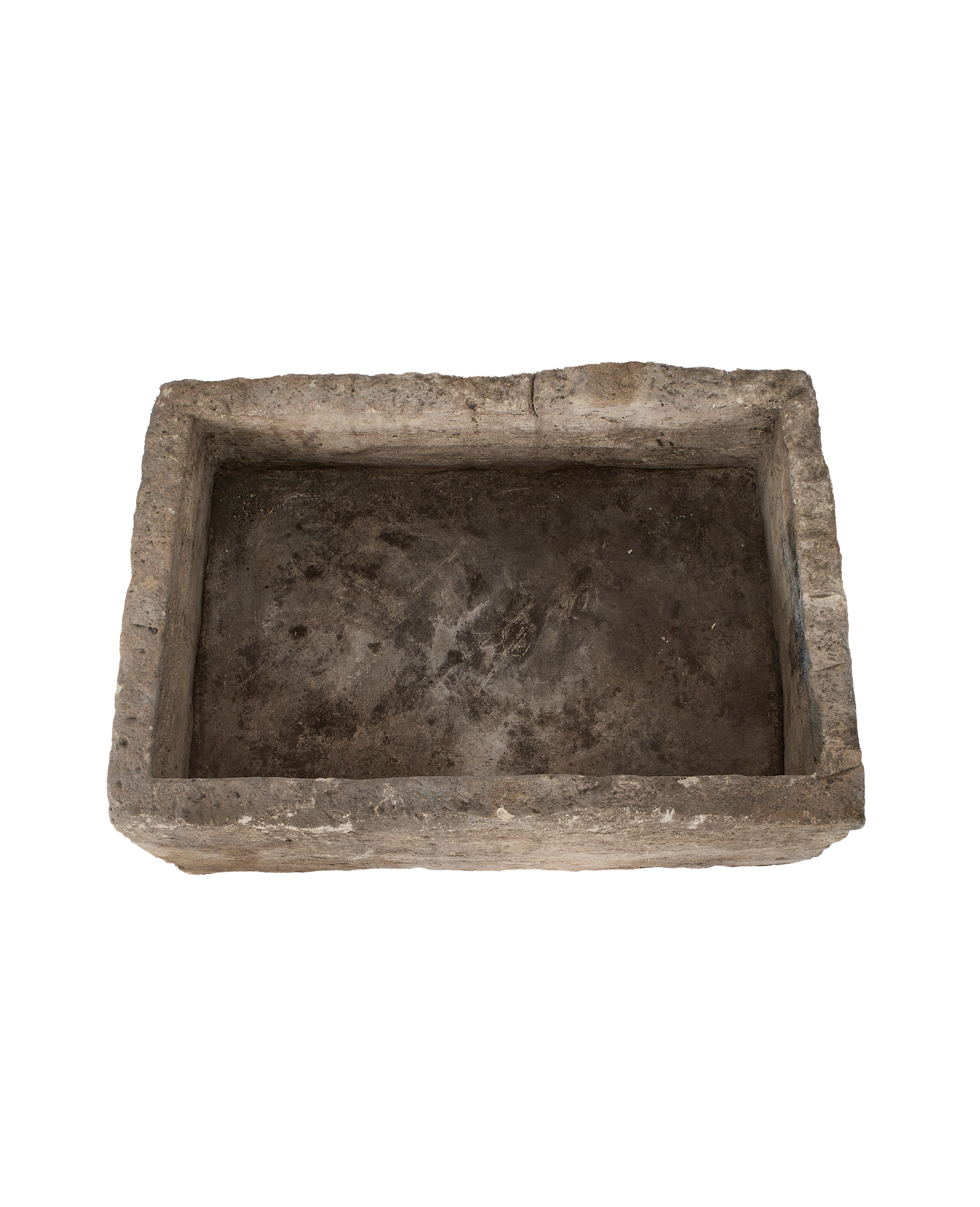 Vintage Indonesian rectangular limestone trough, top-down view showing interior and weathered texture.