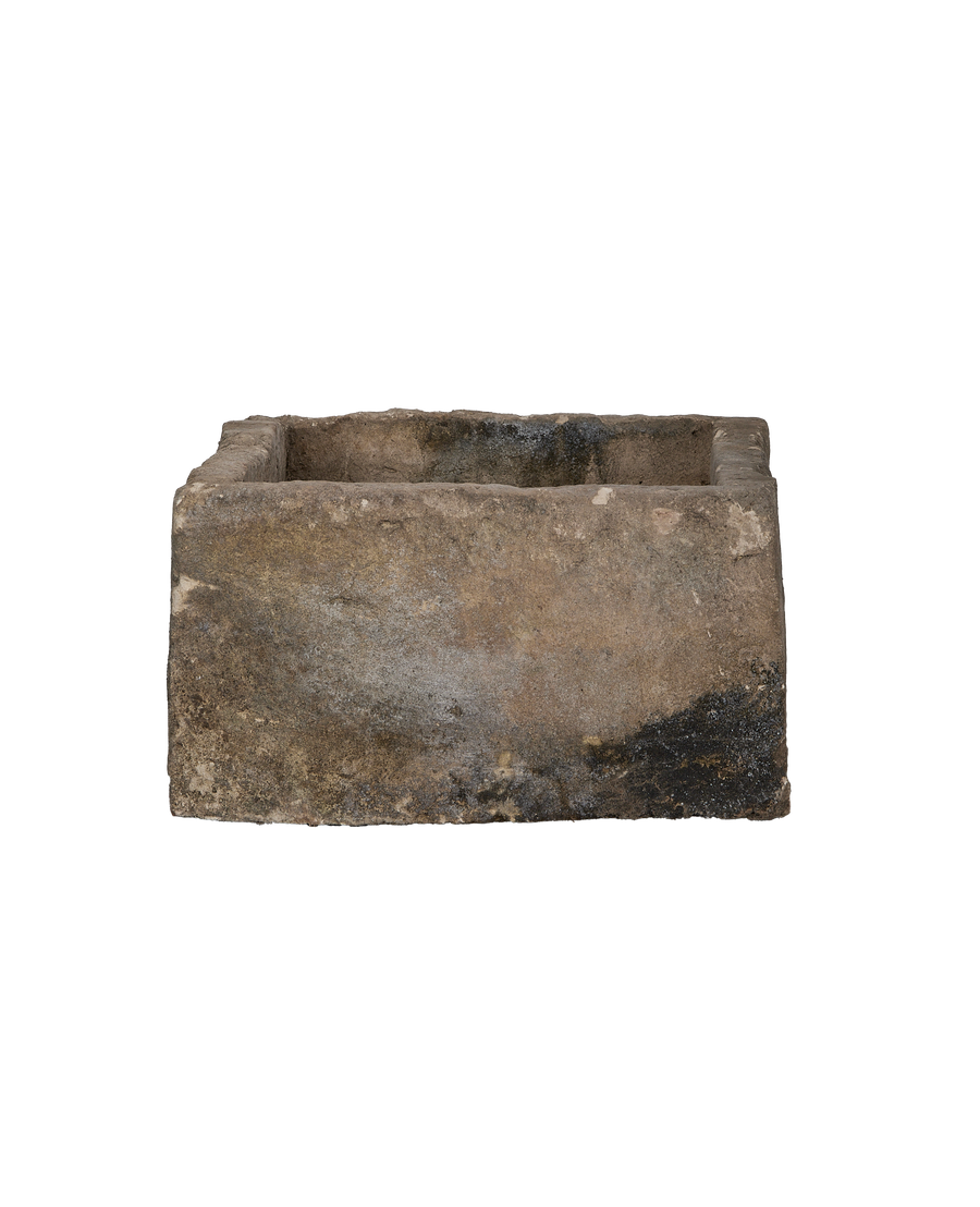 Vintage Indonesian rectangular limestone trough showing weathered outer surface.
