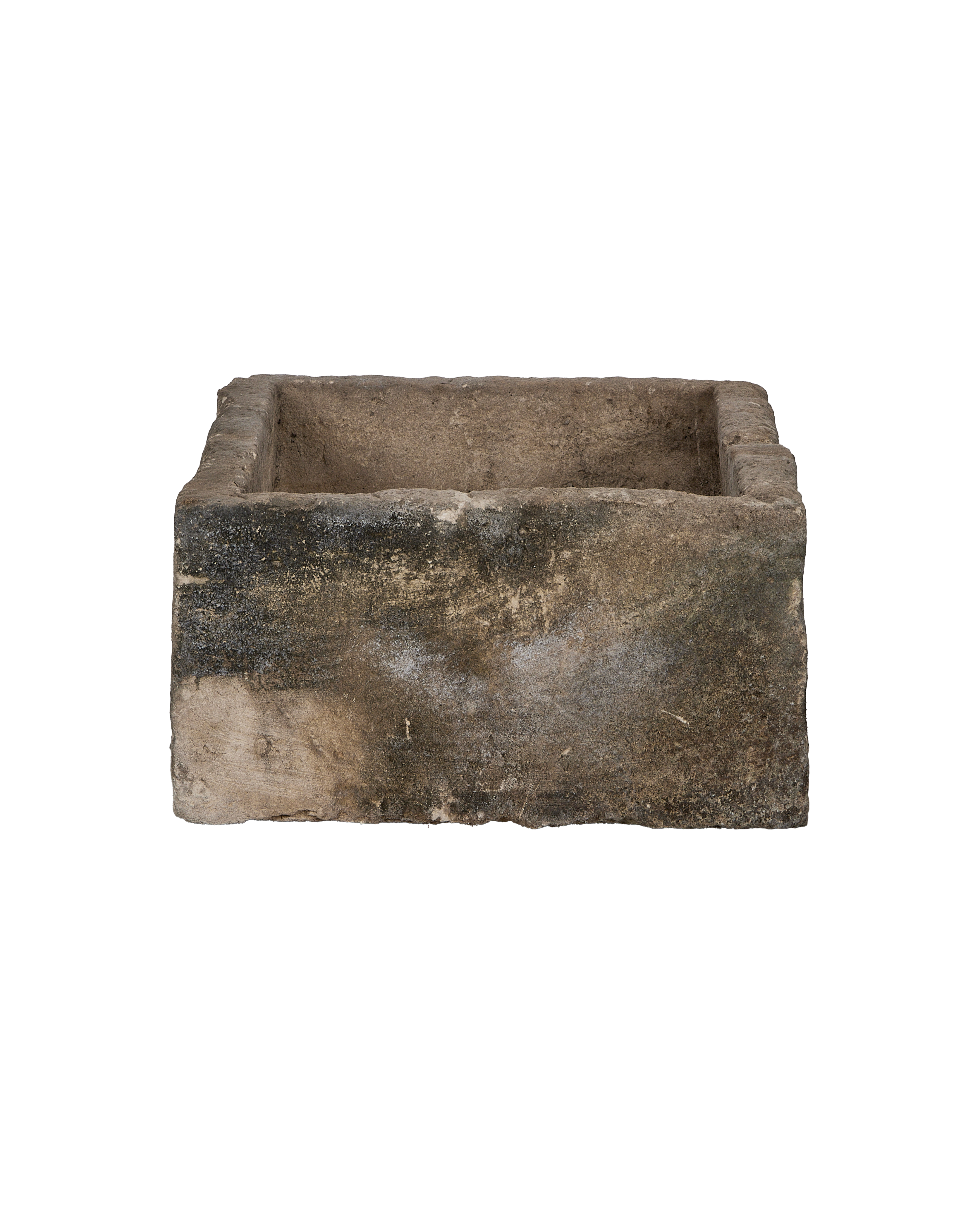 Vintage Indonesian rectangular limestone trough showing weathered, textured surface and top edge.