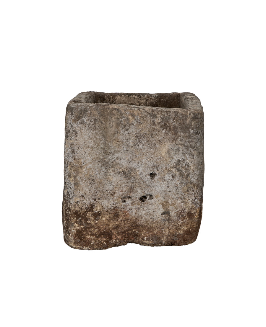 Vintage Indonesian limestone trough, top opening detail highlighting weathered texture and natural imperfections.