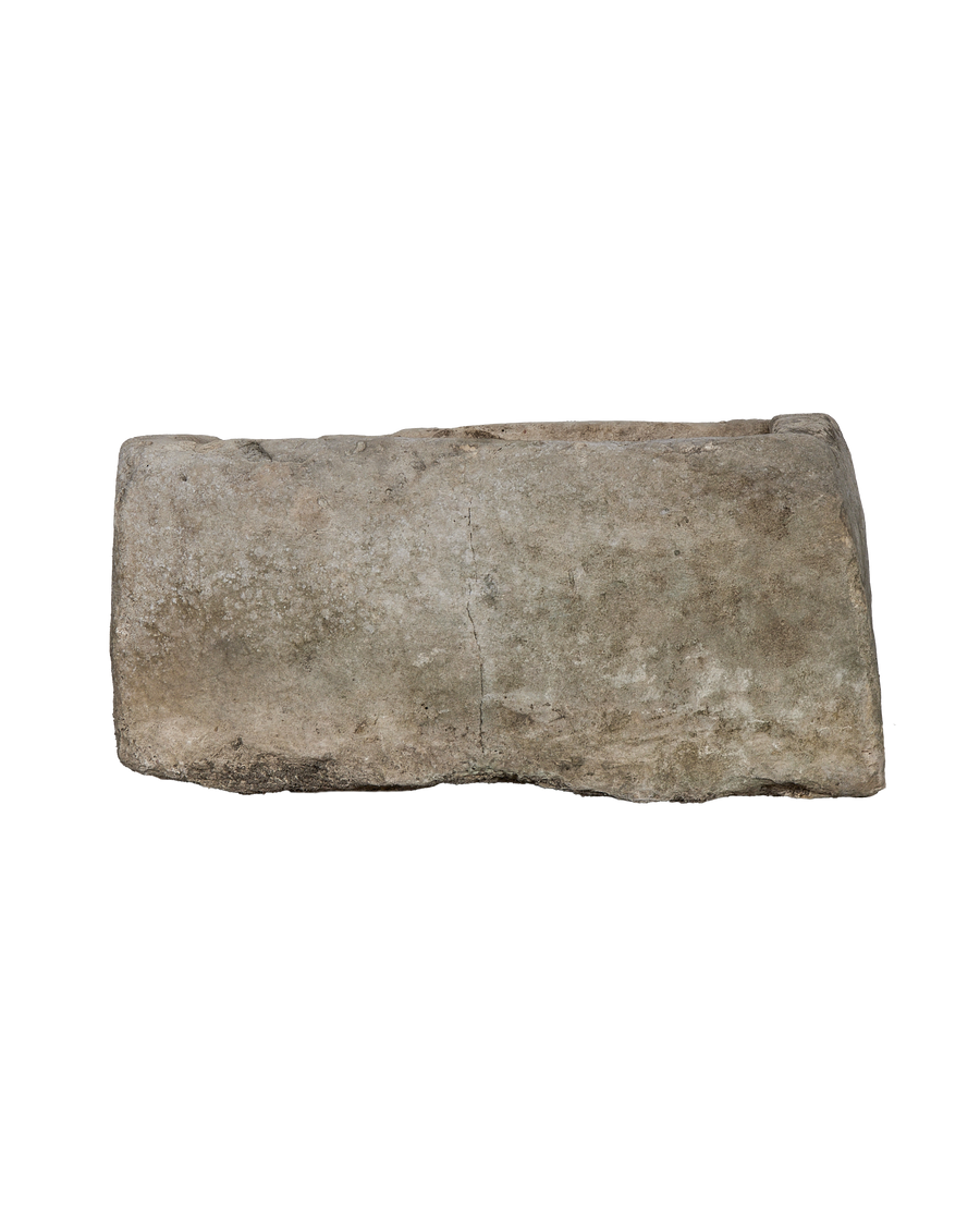 Vintage Indonesian OAK limestone trough with weathered irregular sides, top-down view.