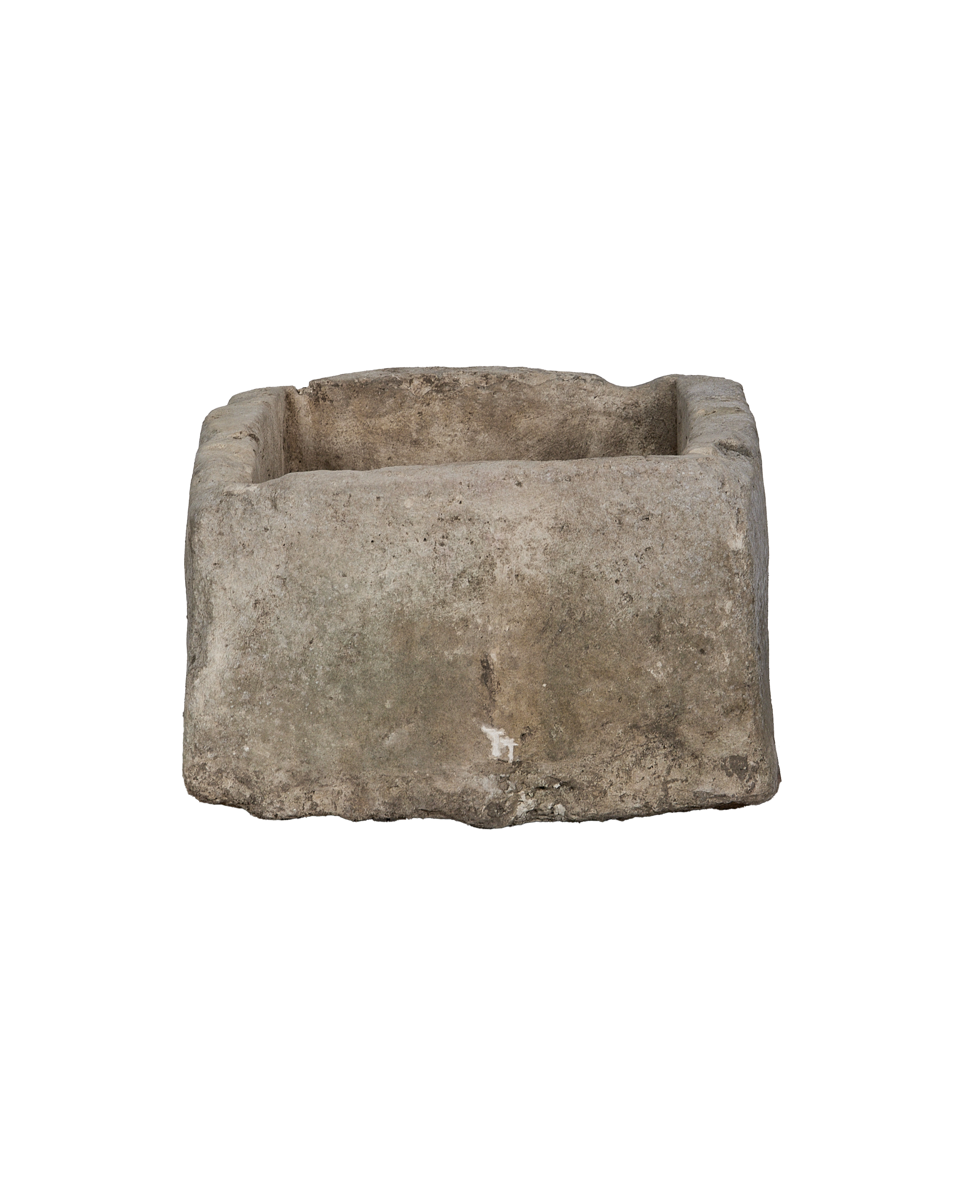 Vintage Indonesian rectangular limestone trough, bottom-level view highlights natural weathering and rough texture.