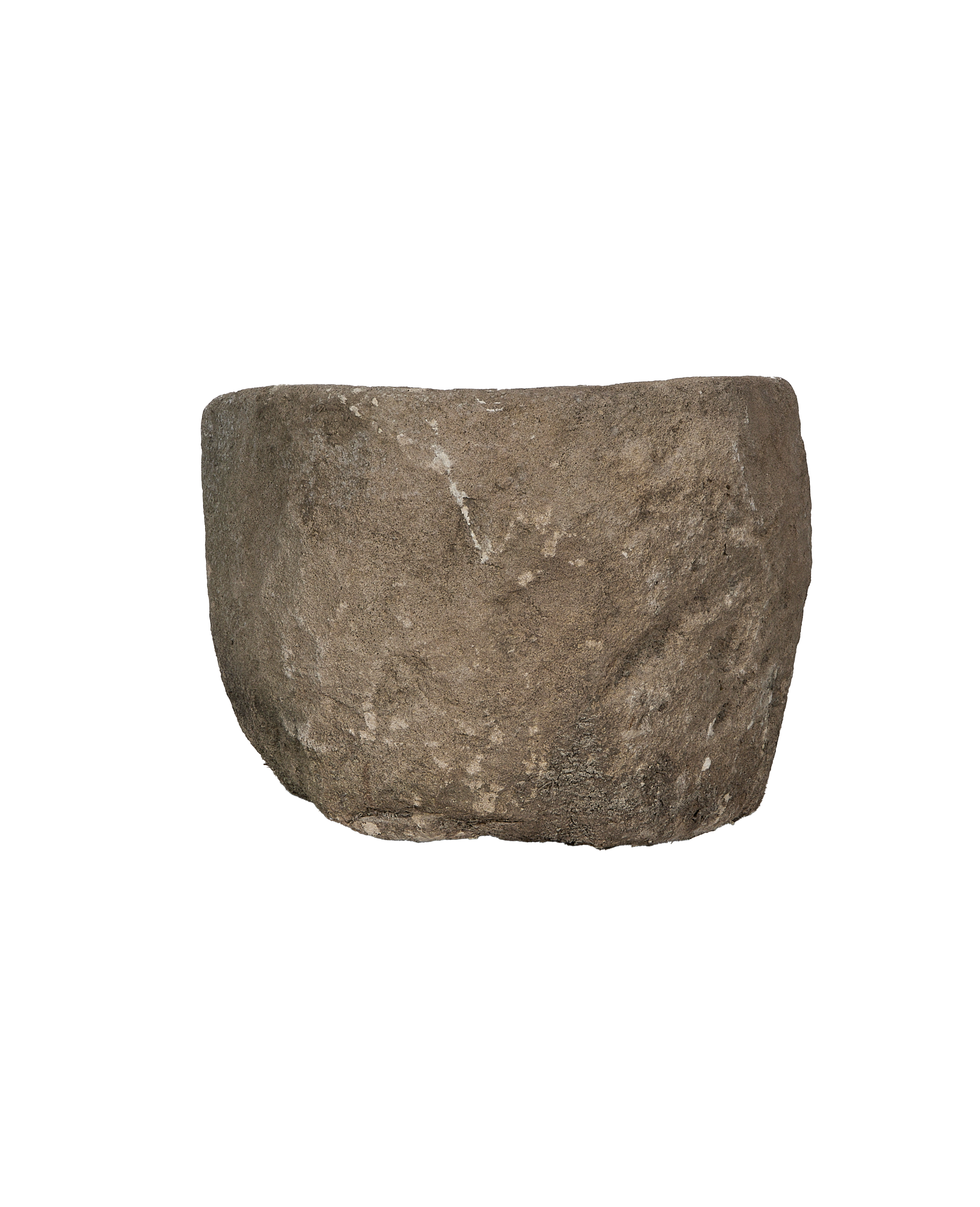 Vintage Indonesian limestone trough, close-up texture details of the rugged exterior.