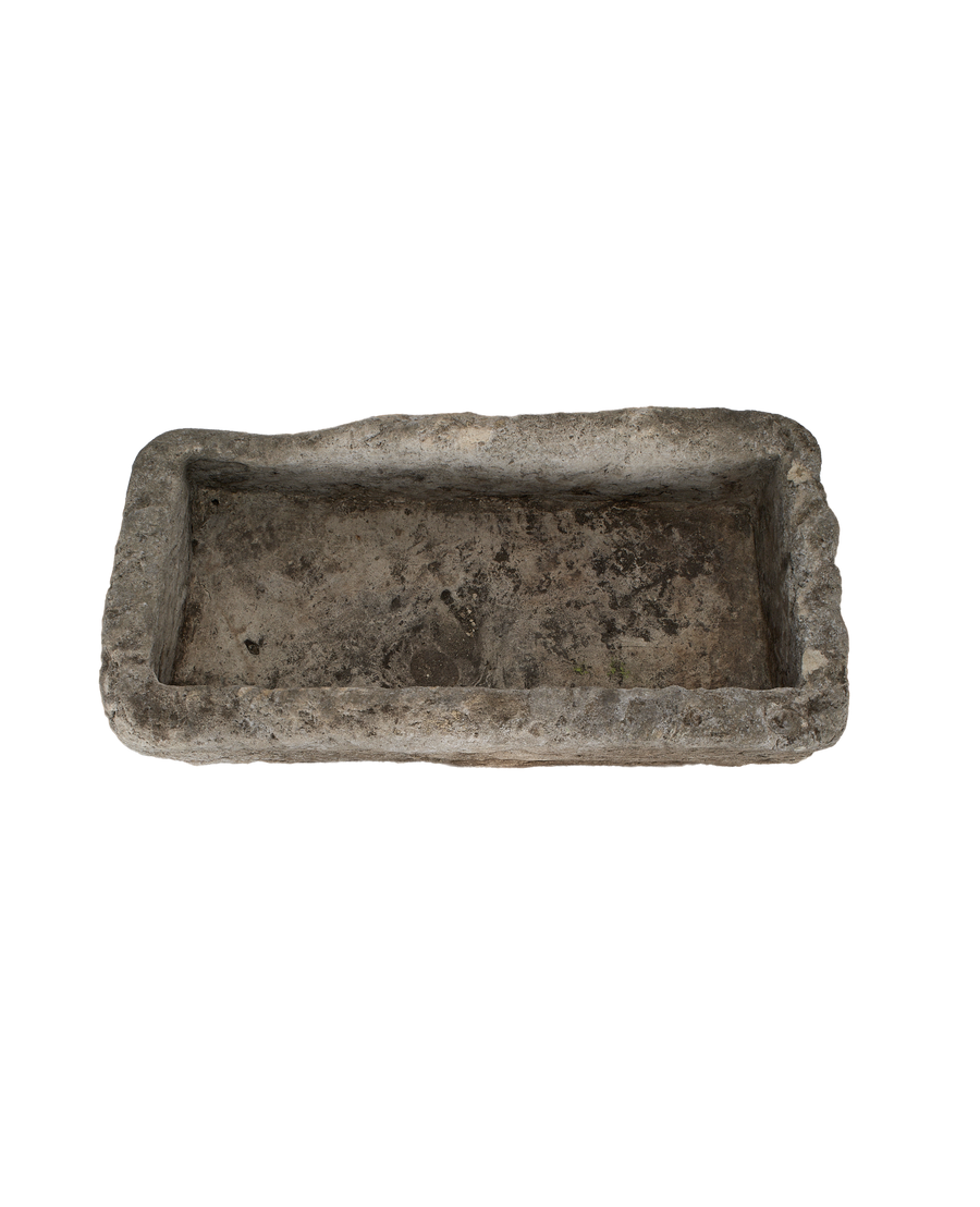 Vintage rectangular limestone trough, weathered gray, with a rough textured interior.