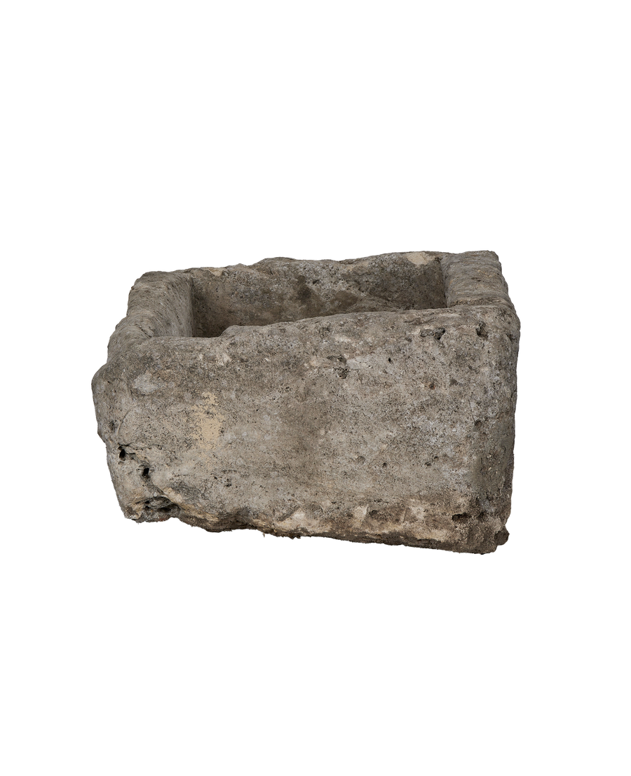 Vintage Indonesian rectangular limestone trough, showcasing rough textured surface, weathered patin, and natural imperfections.