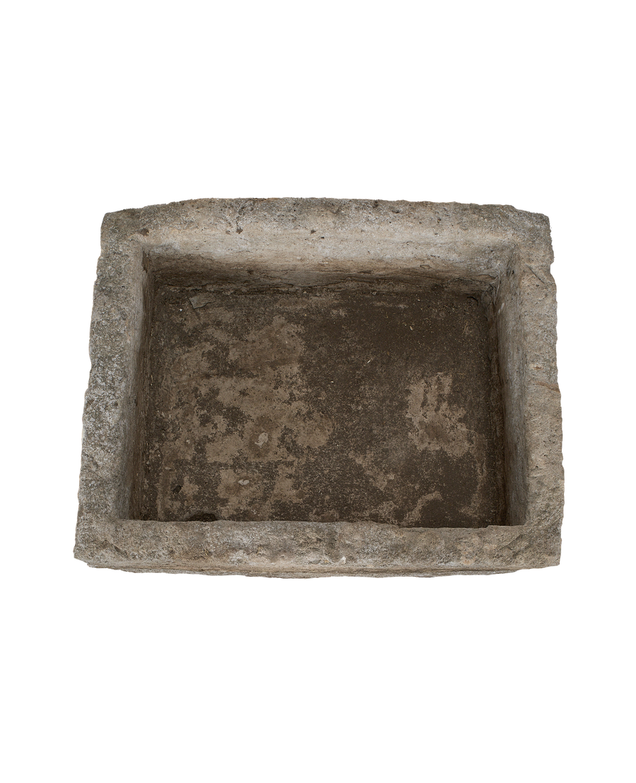 Vintage rectangular Indonesian limestone trough with weathered, textured interior.