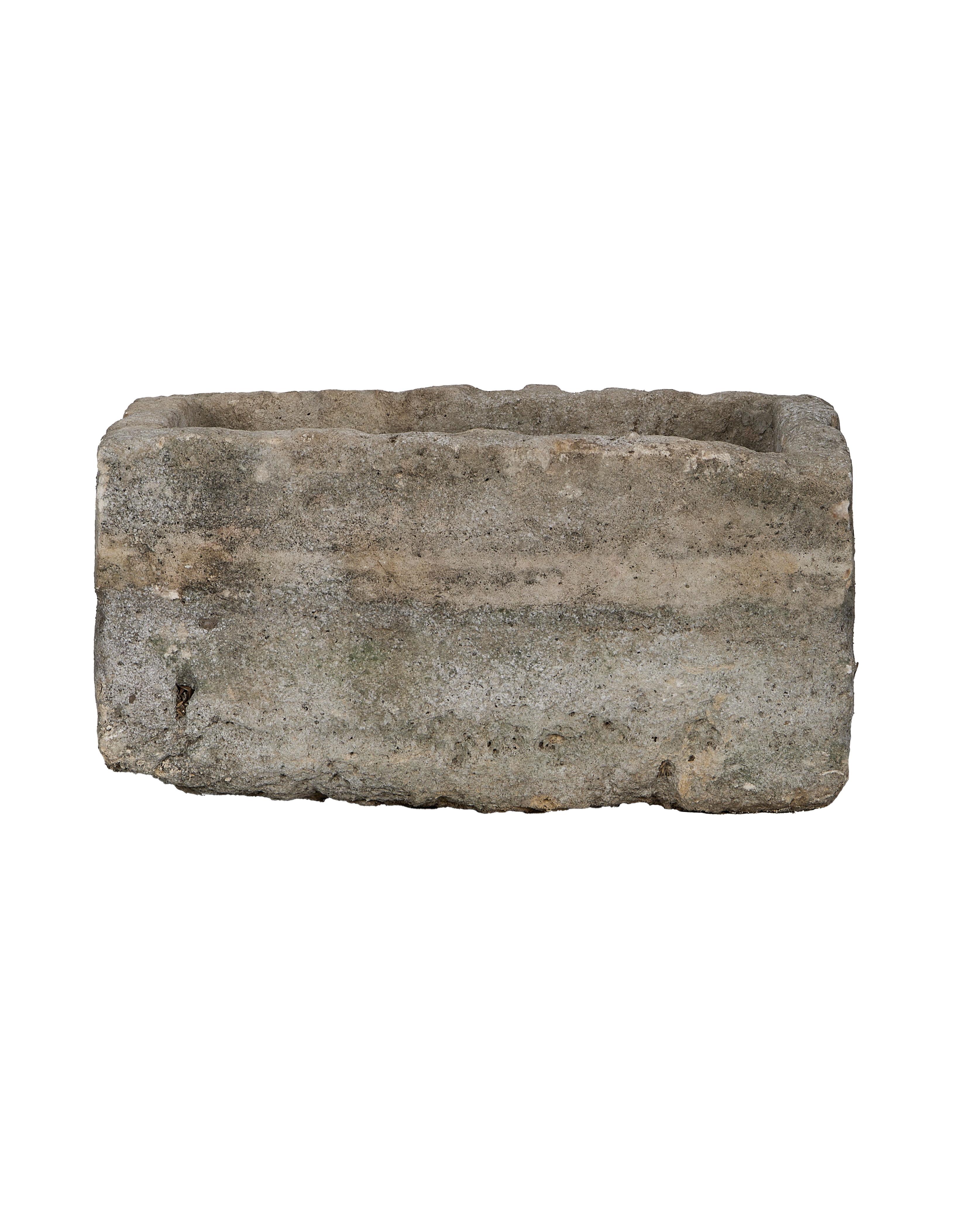 Vintage Indonesian limestone trough, rectangular, revealing textured surface and rugged bottom edge.