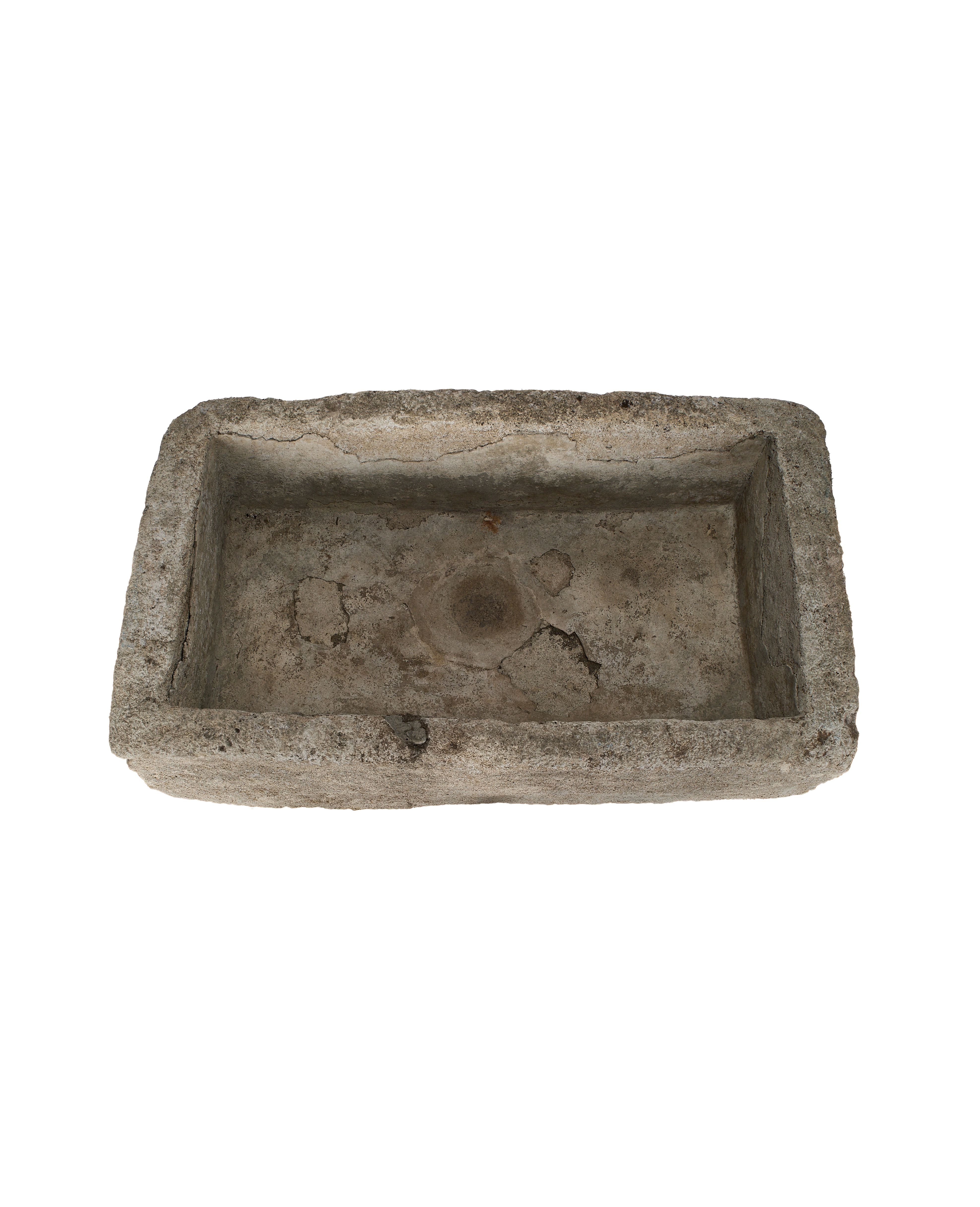Vintage Indonesian rectangular limestone trough showing weathered, textured interior.