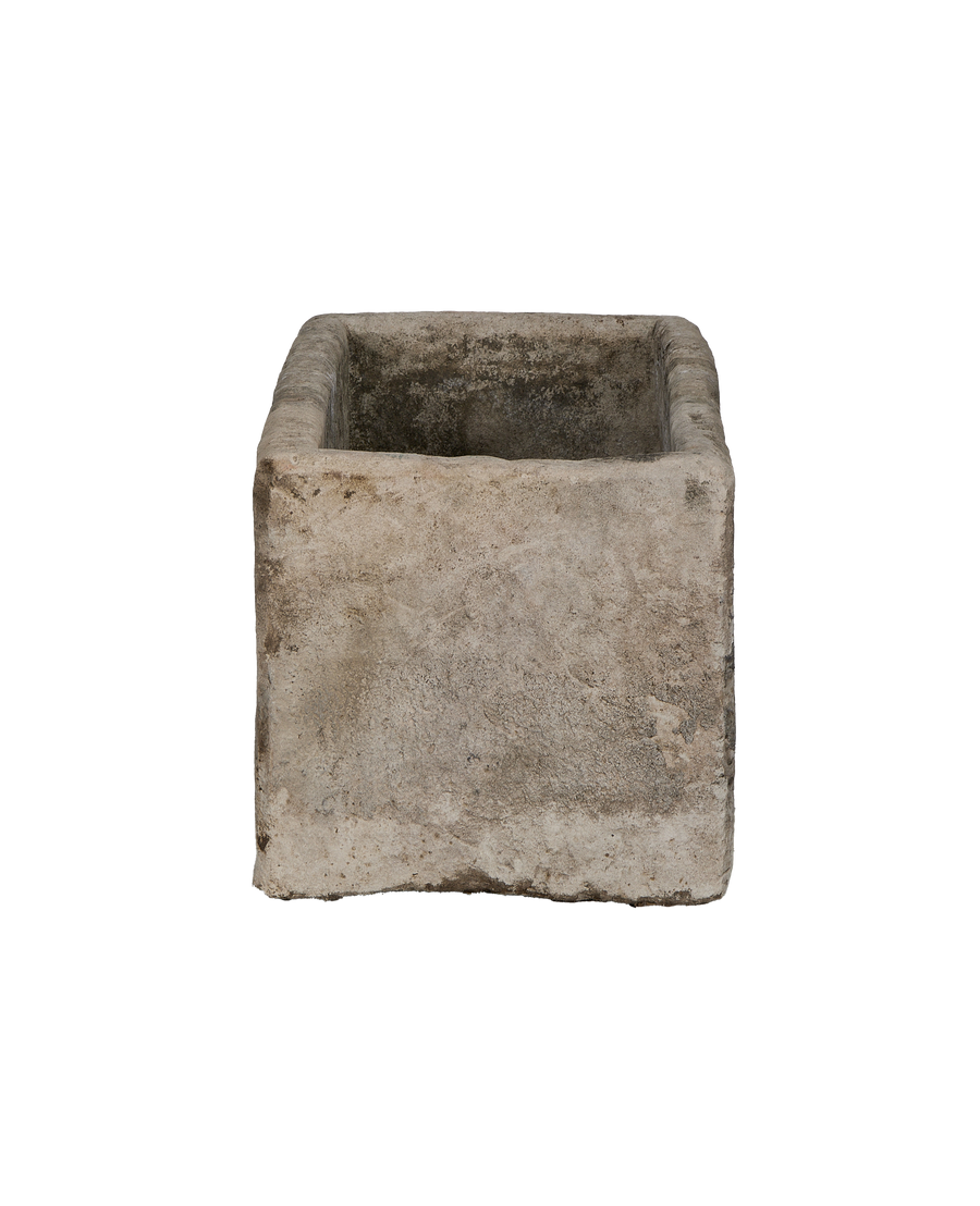 Vintage Indonesian limestone rectangular trough, showing exterior texture and weathered interior.