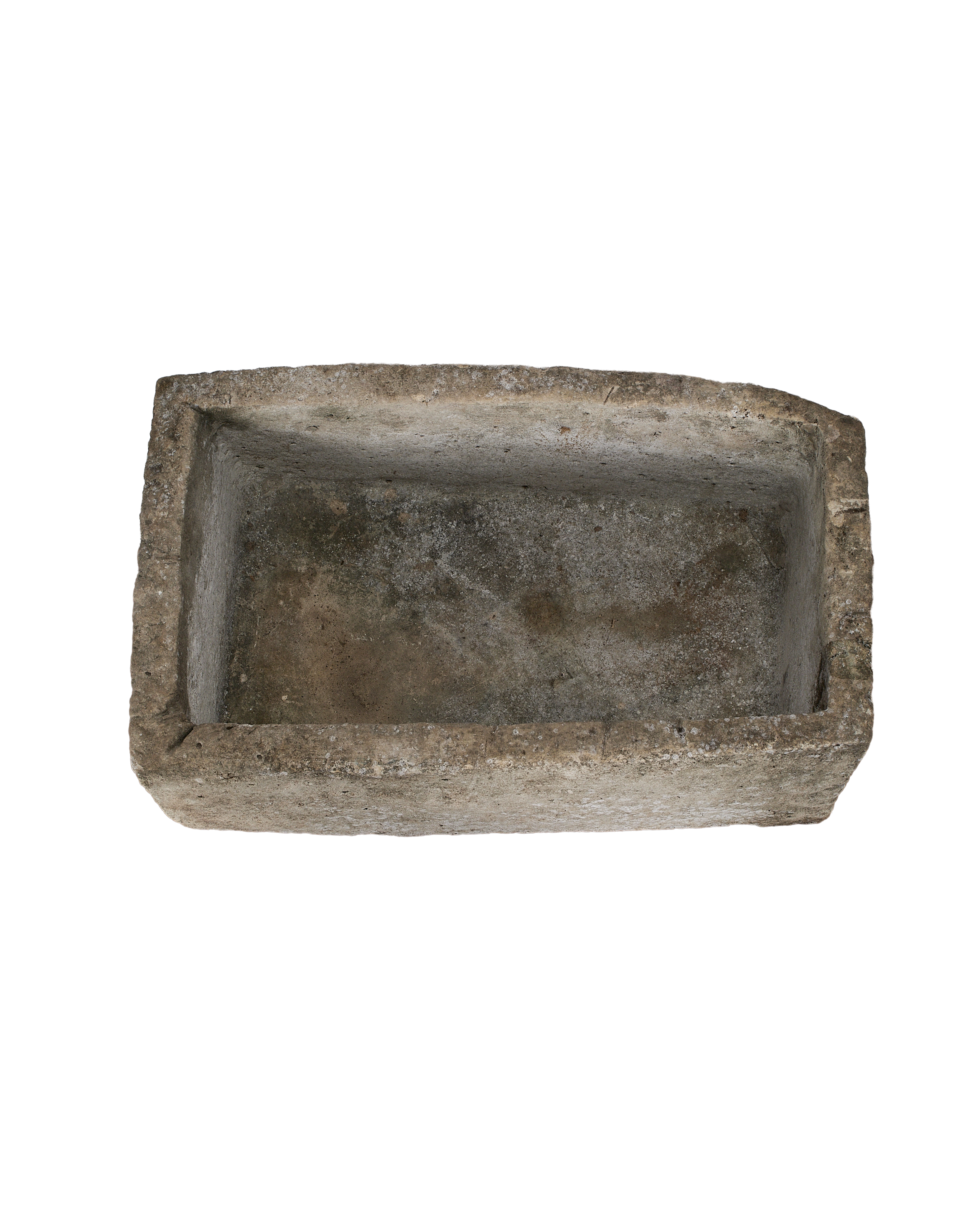 Vintage Indonesian limestone trough, top-down view showing interior depth and irregular texture.