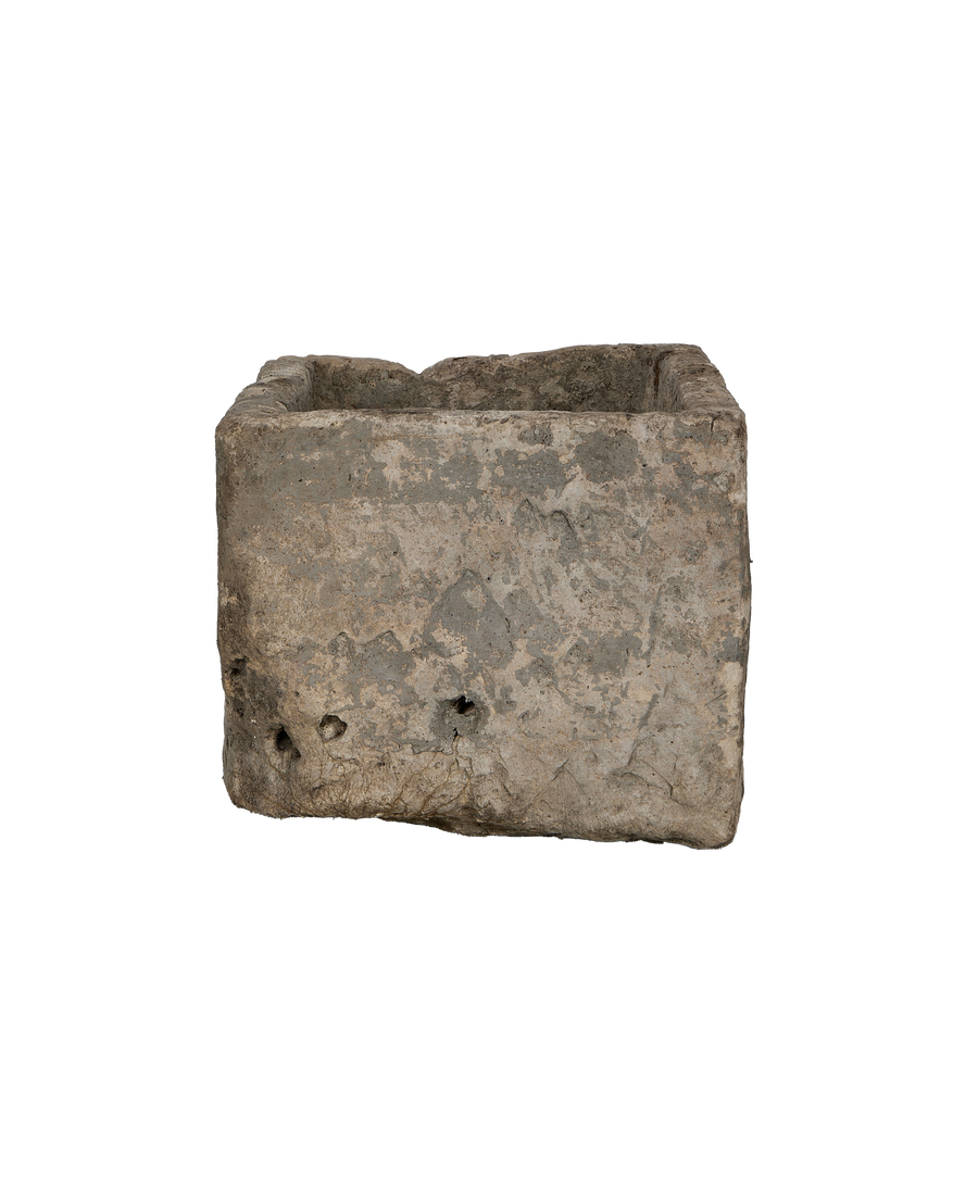 Vintage Indonesian limestone trough, rectangular, showcasing textured grey stone exterior and rough interior.