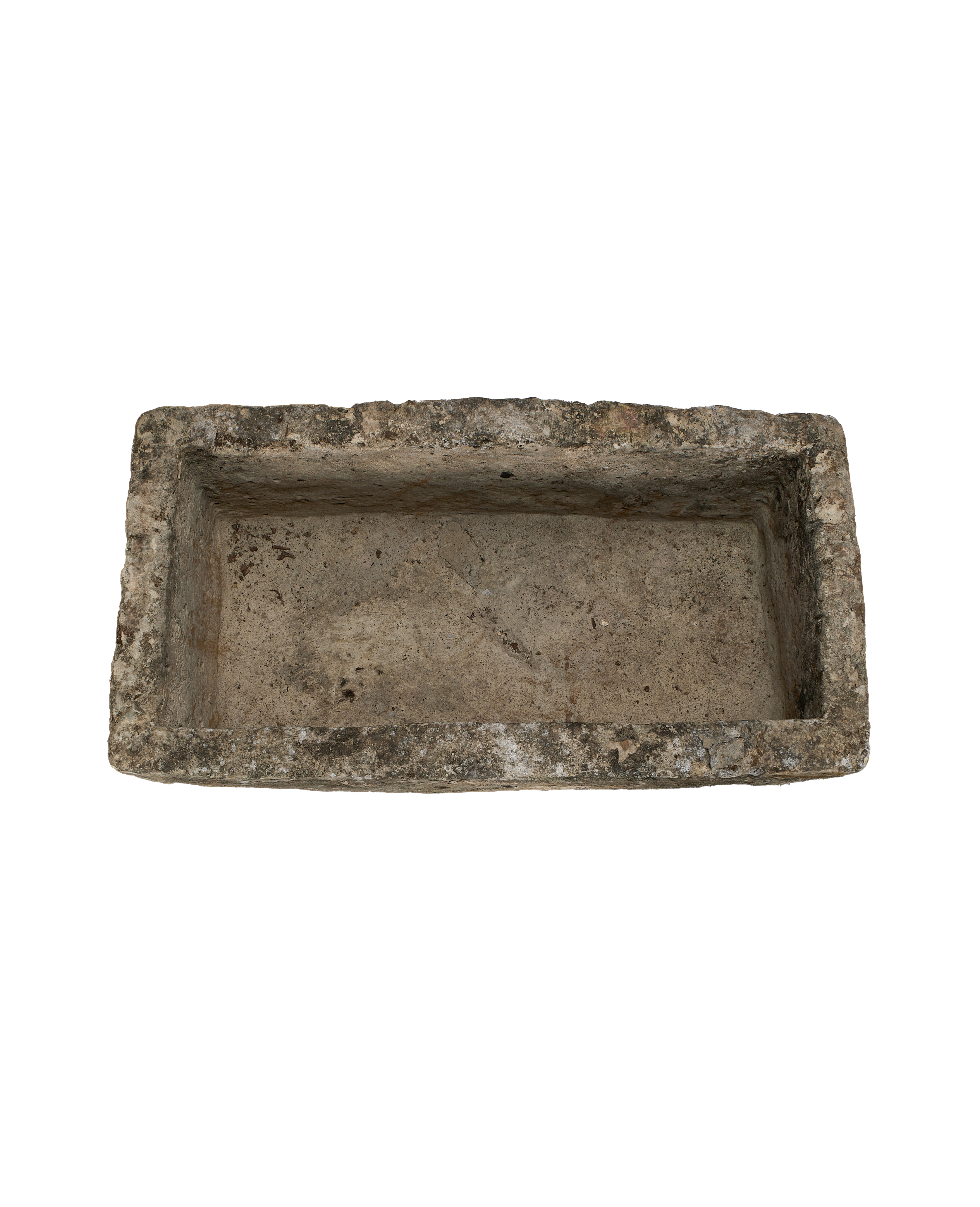 Vintage rectangular Indonesian limestone trough with rough, aged interior and exterior texture from above.