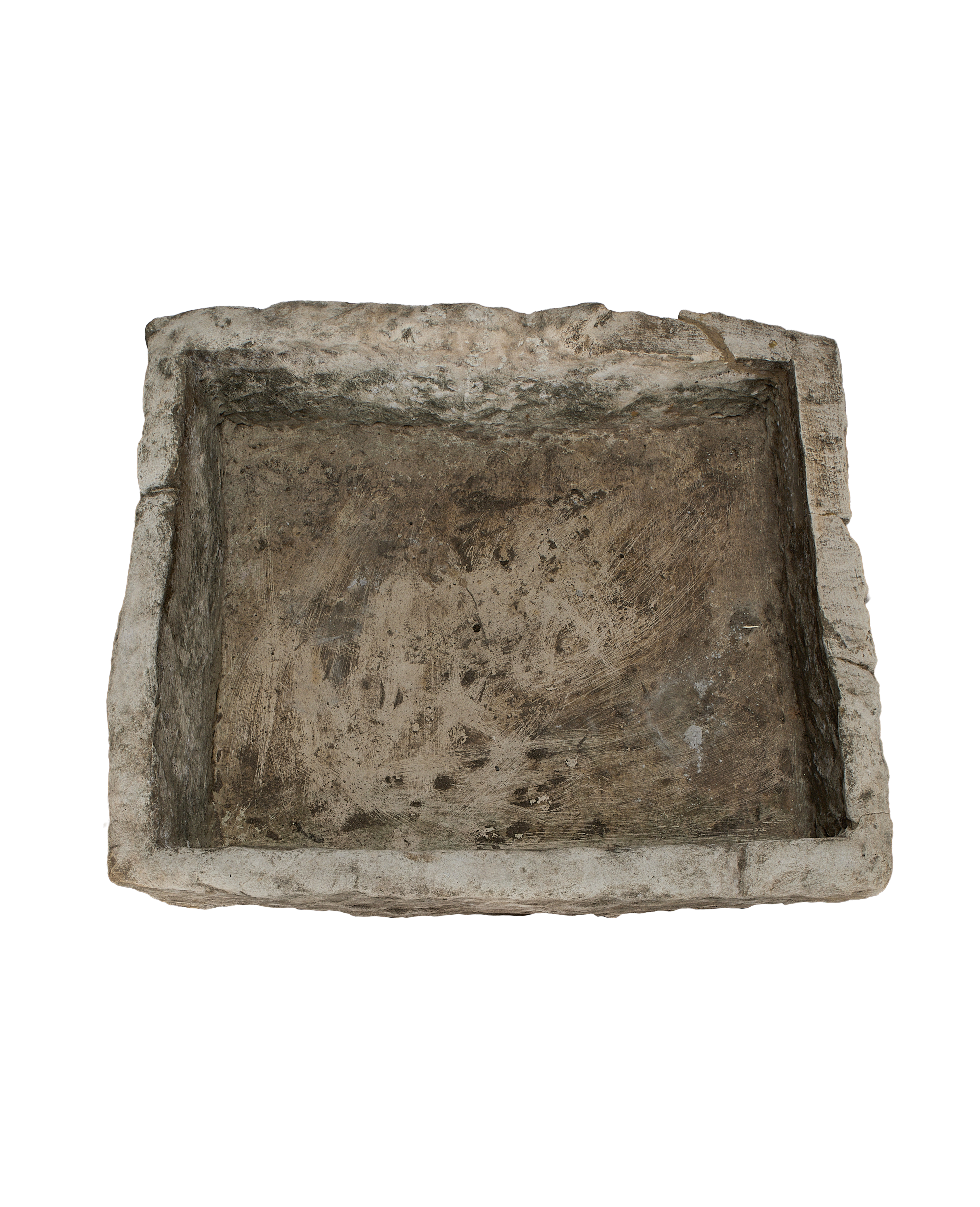 Vintage rectangular limestone trough, showing the rustic, textured interior with varied tones and worn surface.