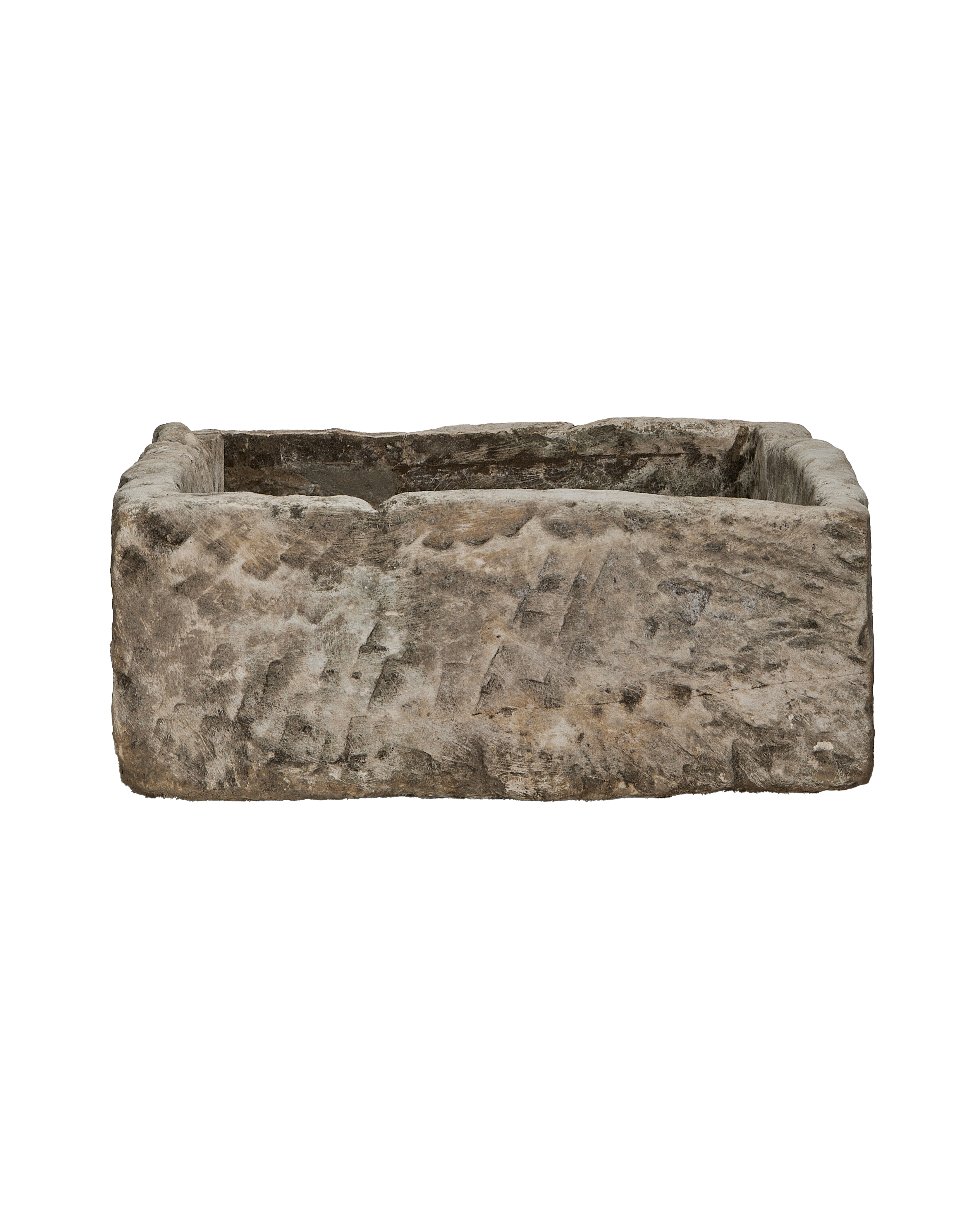 Vintage Indonesian rectangular limestone trough showing rough-hewn exterior texture and detail.