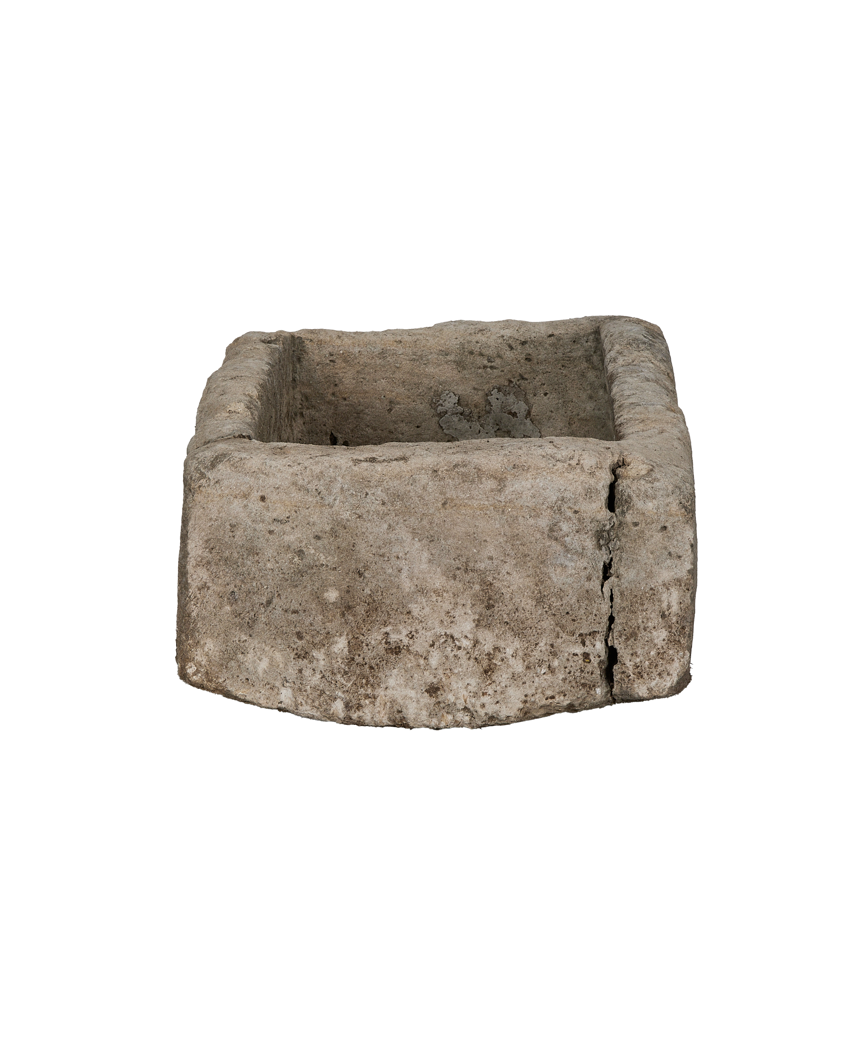 Vintage limestone rectangular trough, angled view highlighting the weathered texture and crack on the side.