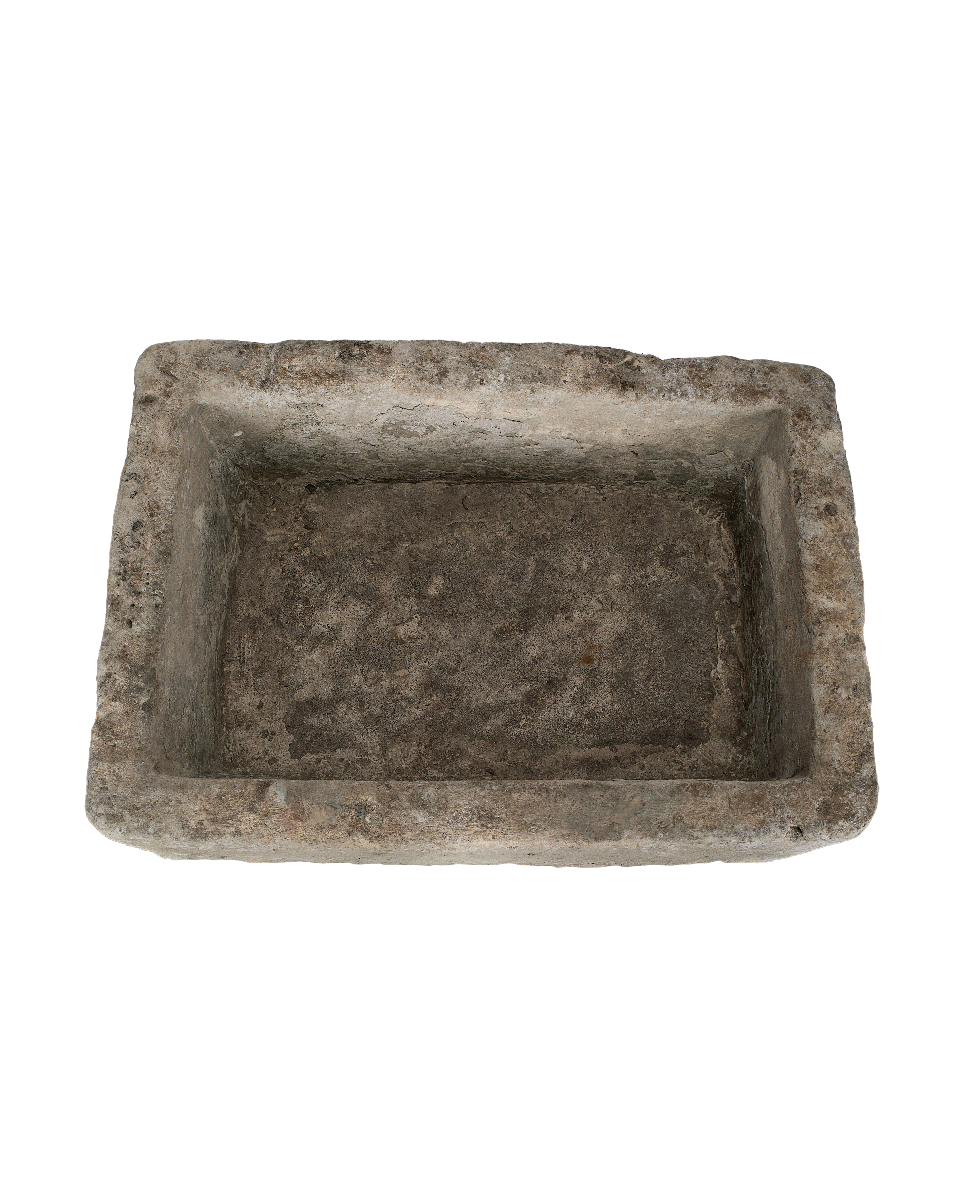 Vintage limestone rectangular trough from Indonesia, viewed looking into its weathered, textured interior.