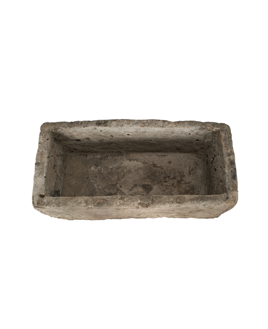 Vintage Indonesian rectangular limestone trough, top-down view highlighting weathered interior texture.