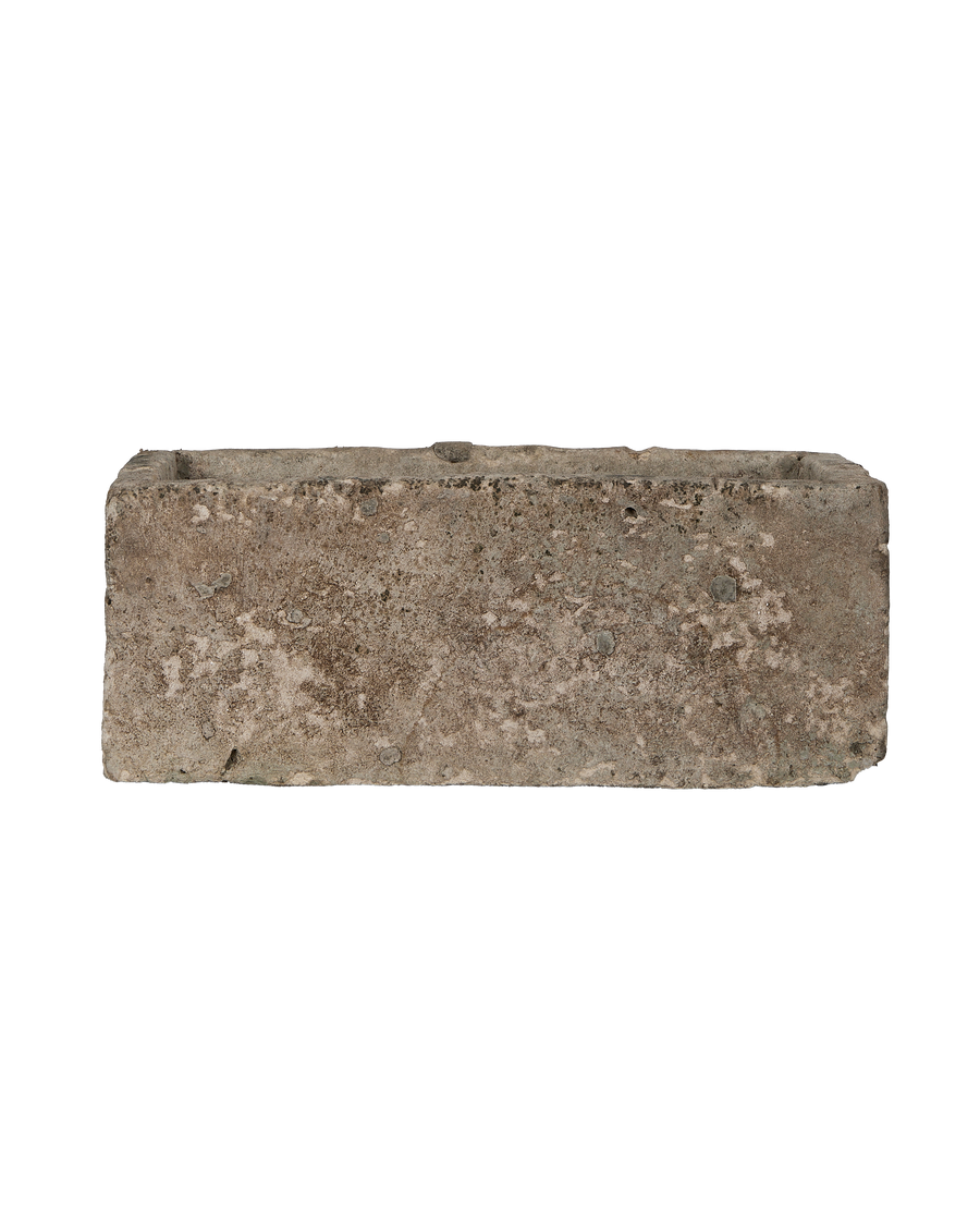 Vintage Indonesian rectangular limestone trough, full-length, showing weathered, textured surface and worn edges.