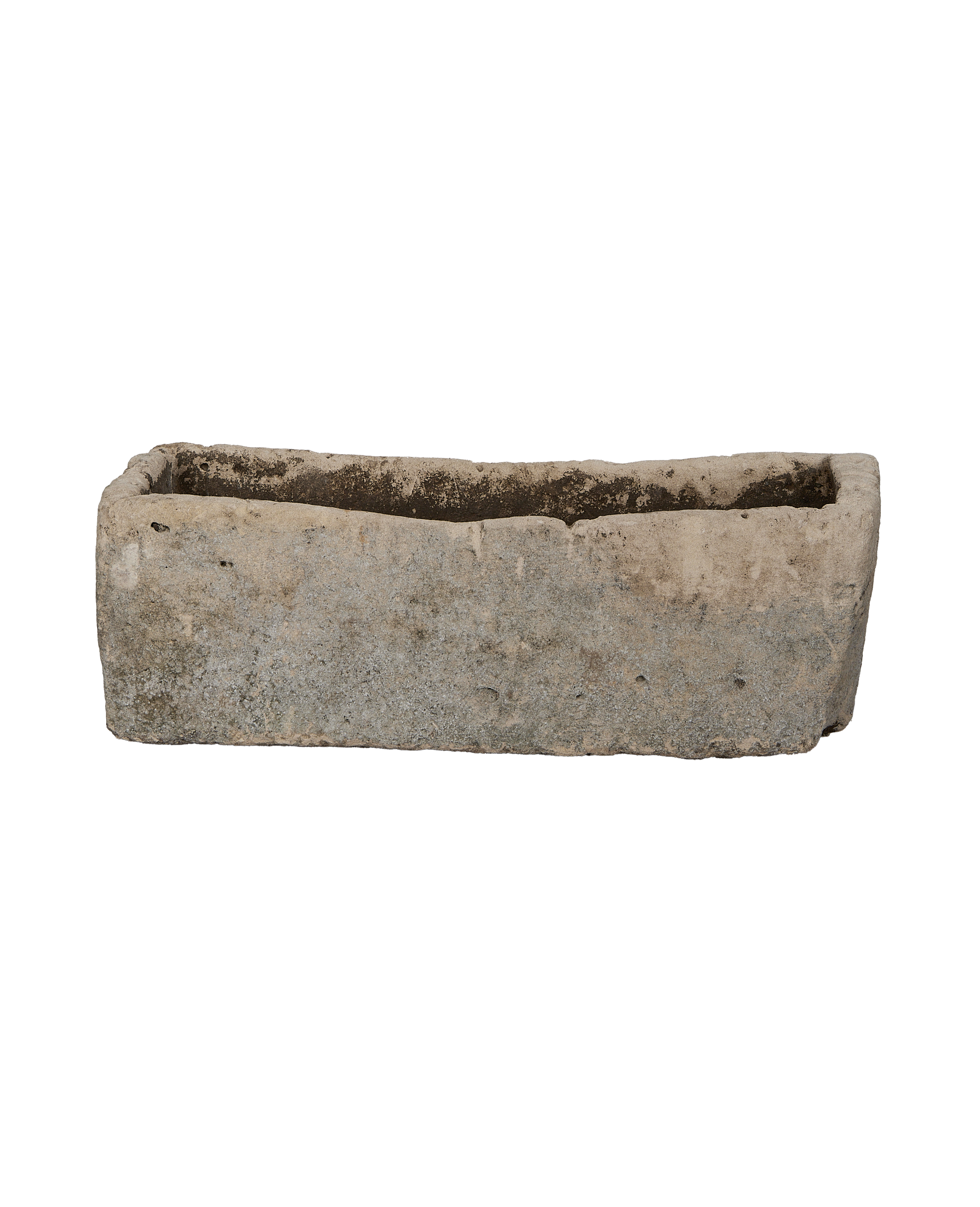 Vintage Indonesian limestone garden trough with weathered texture from front angle.