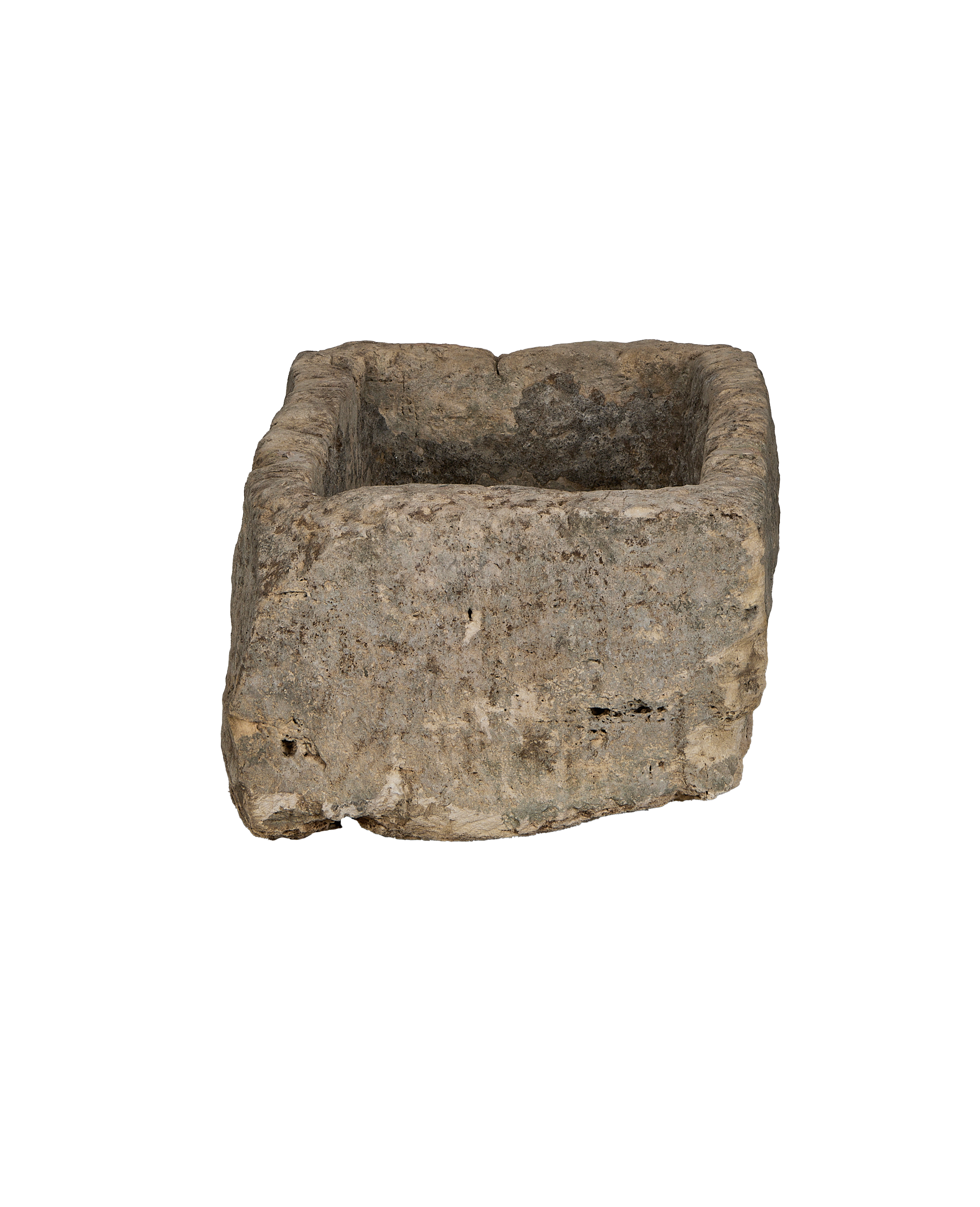 Vintage limestone trough, rectangular, showing weathered, textured exterior from Indonesian origin.